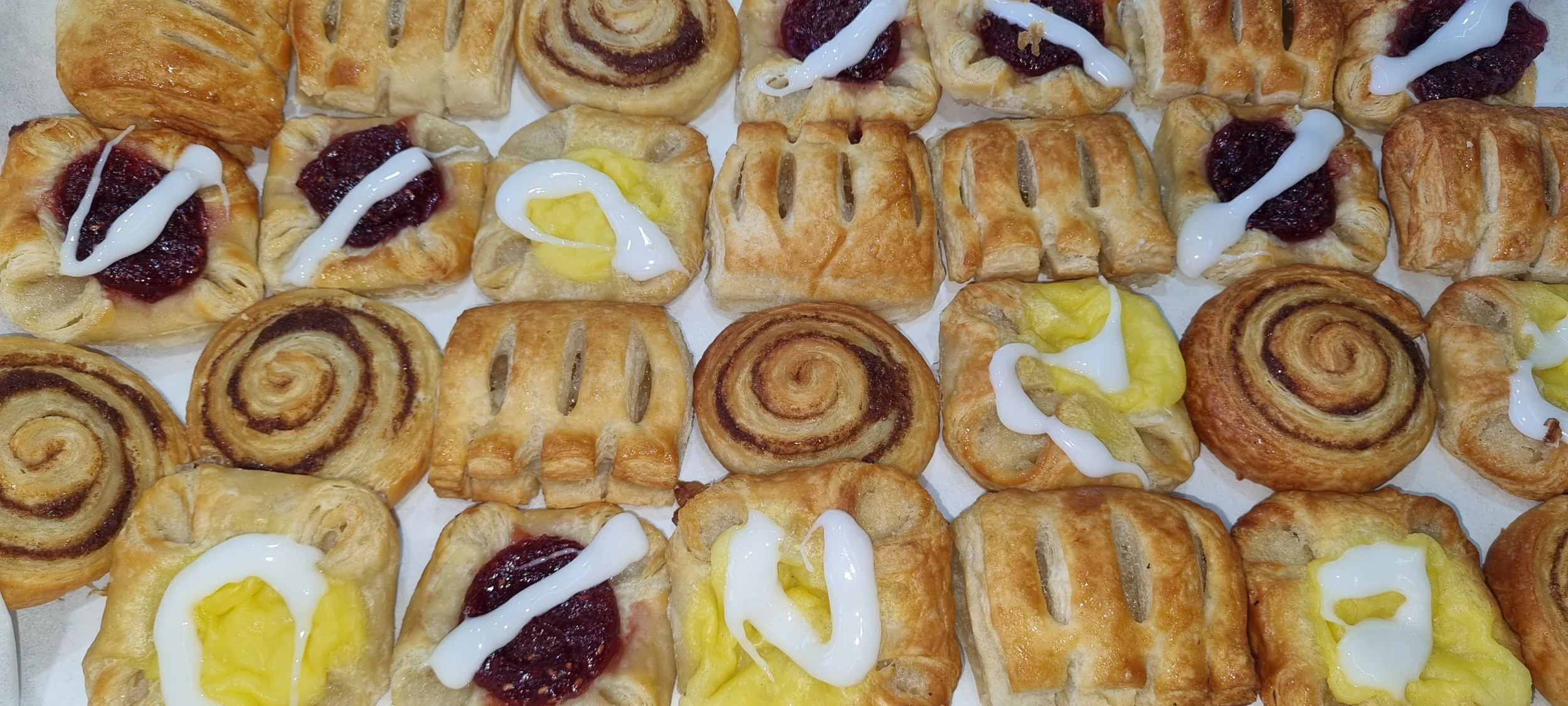 Variety of Freshly Baked Danish & Pastries