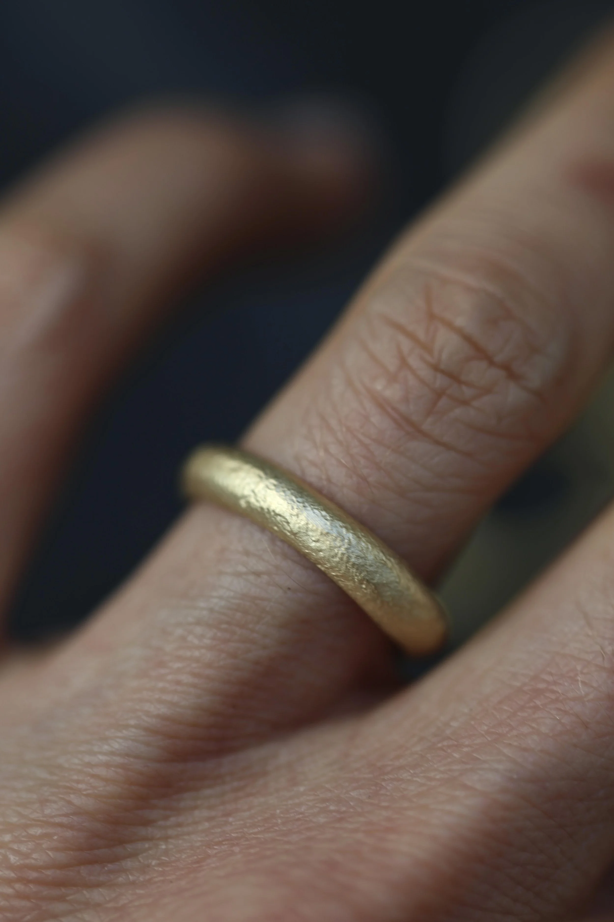 comfort-wide-gold-sandcast-wedding-ring.jpeg