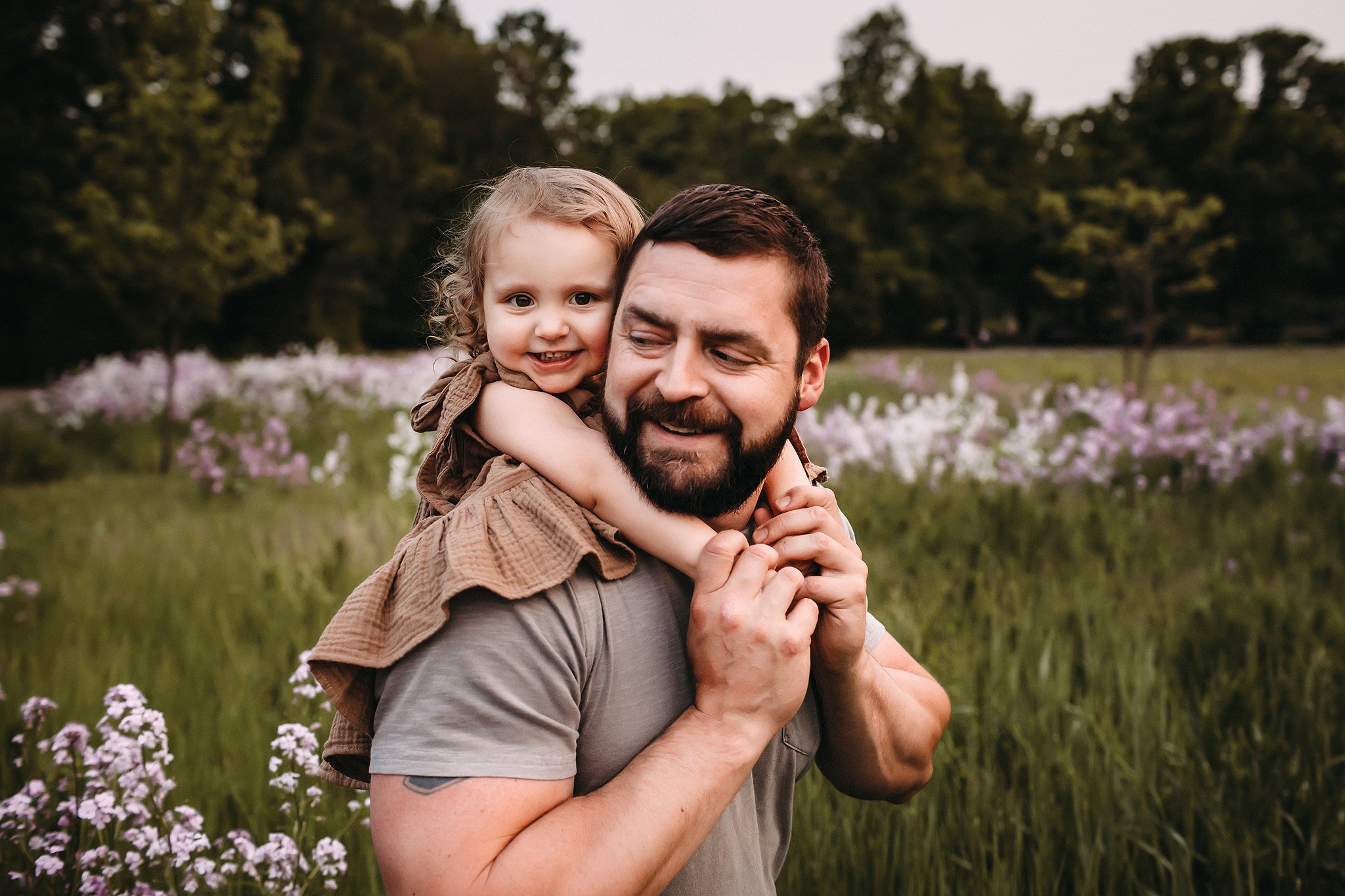Little girl smiling with dad