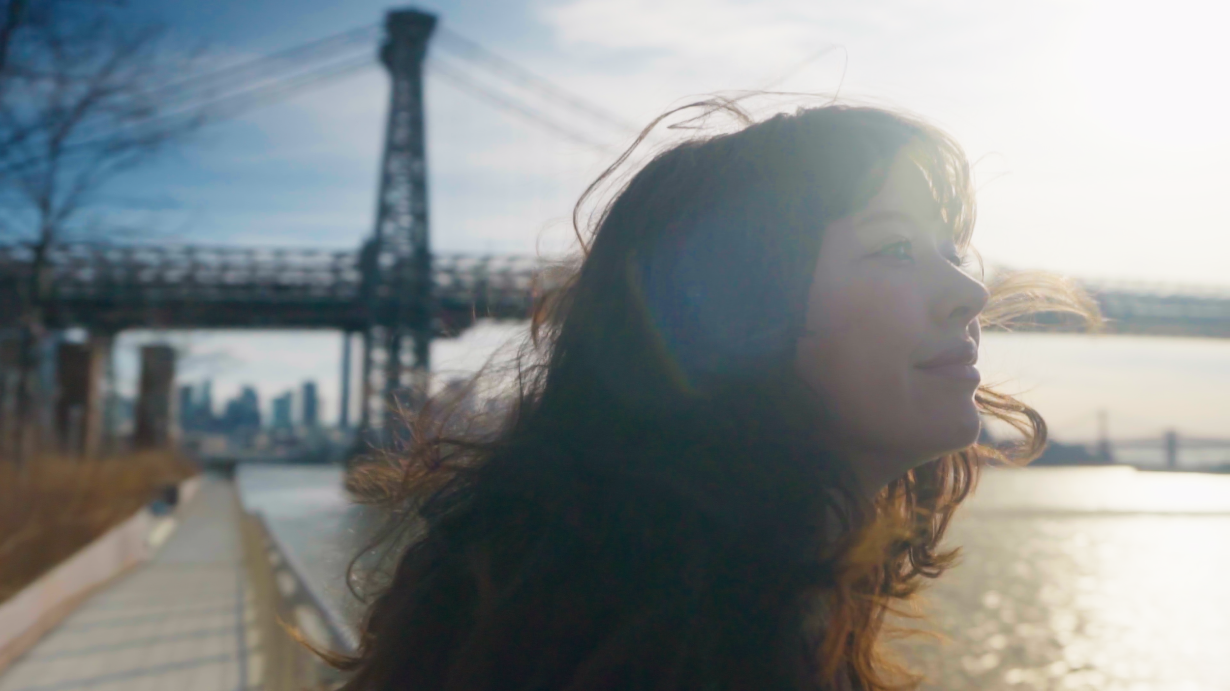 Rayne NYC Overlooking River.png