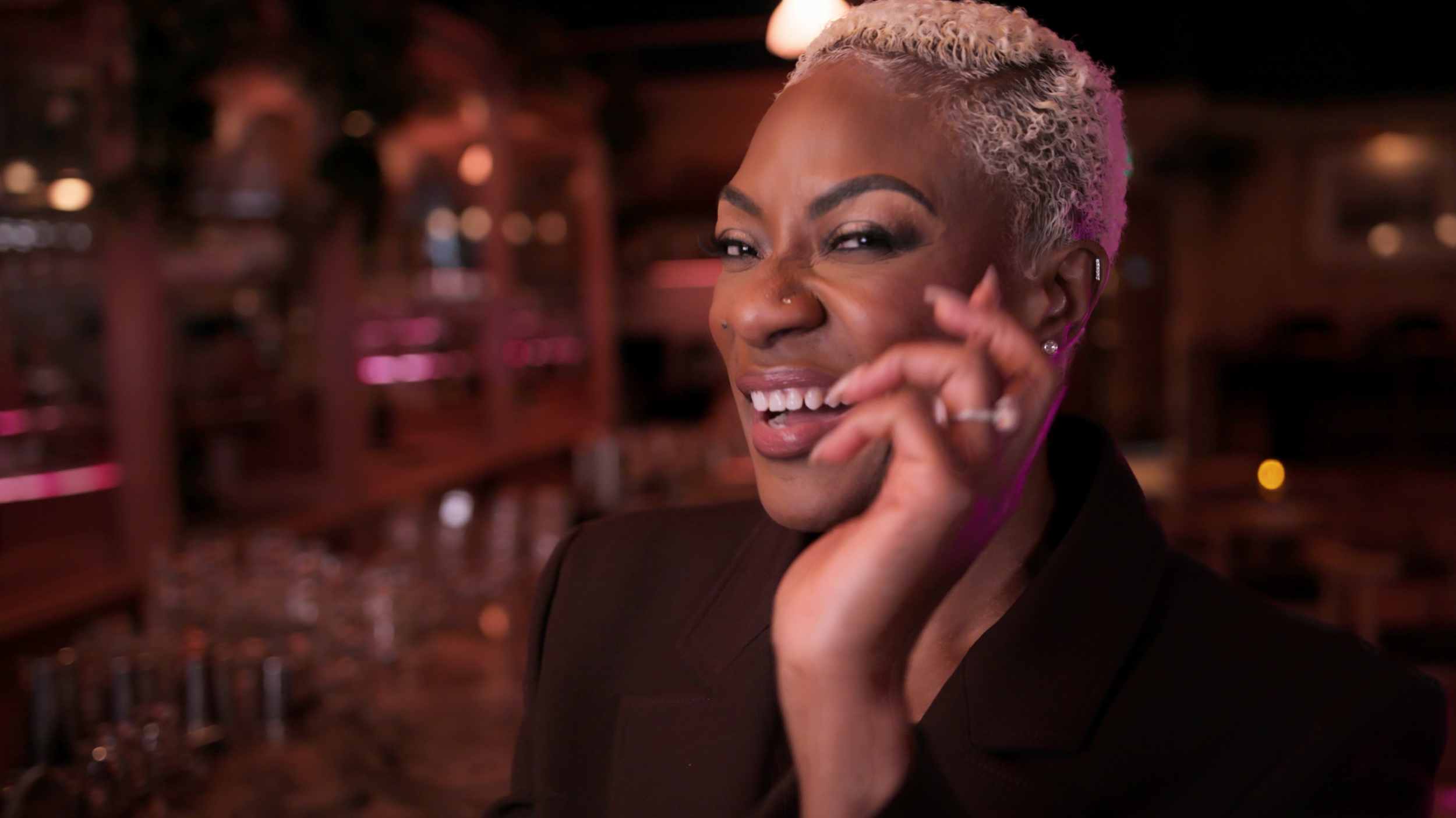 Jully At Bar Smiling.png