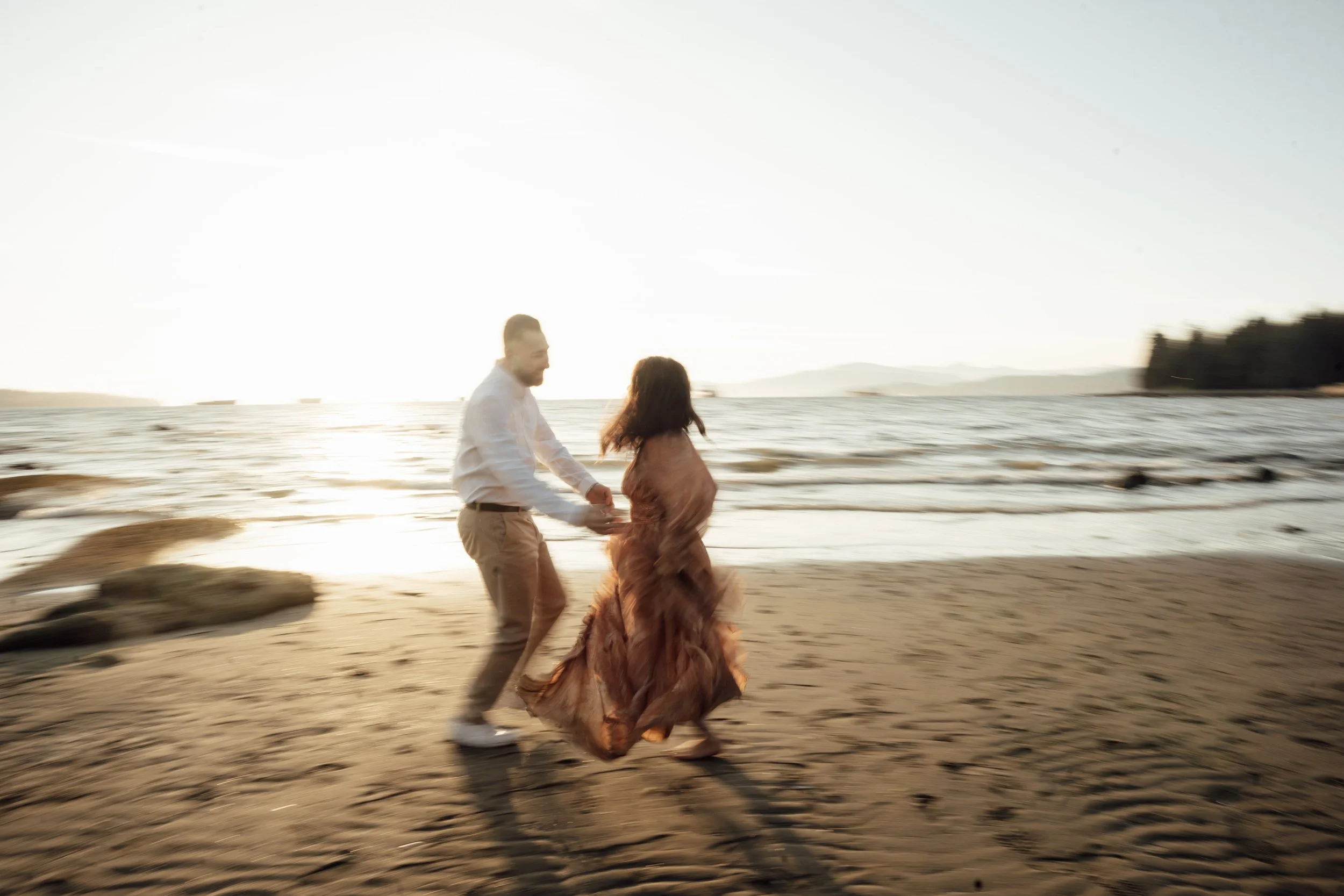 vancouver engagement phtoographer in downtown vancouver beach