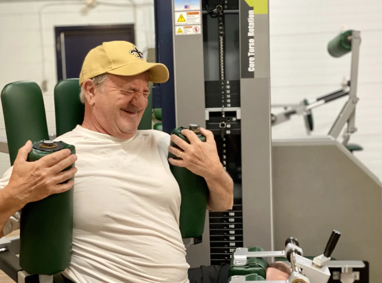 Access Strength golfer training on a rotation machine