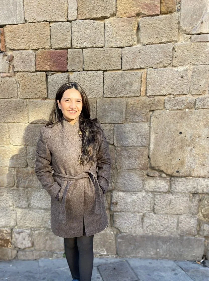 Kriti Basra, the creative designer and founder of Shubhlekh, specializing in bespoke luxury gold foil Indian wedding invitations.