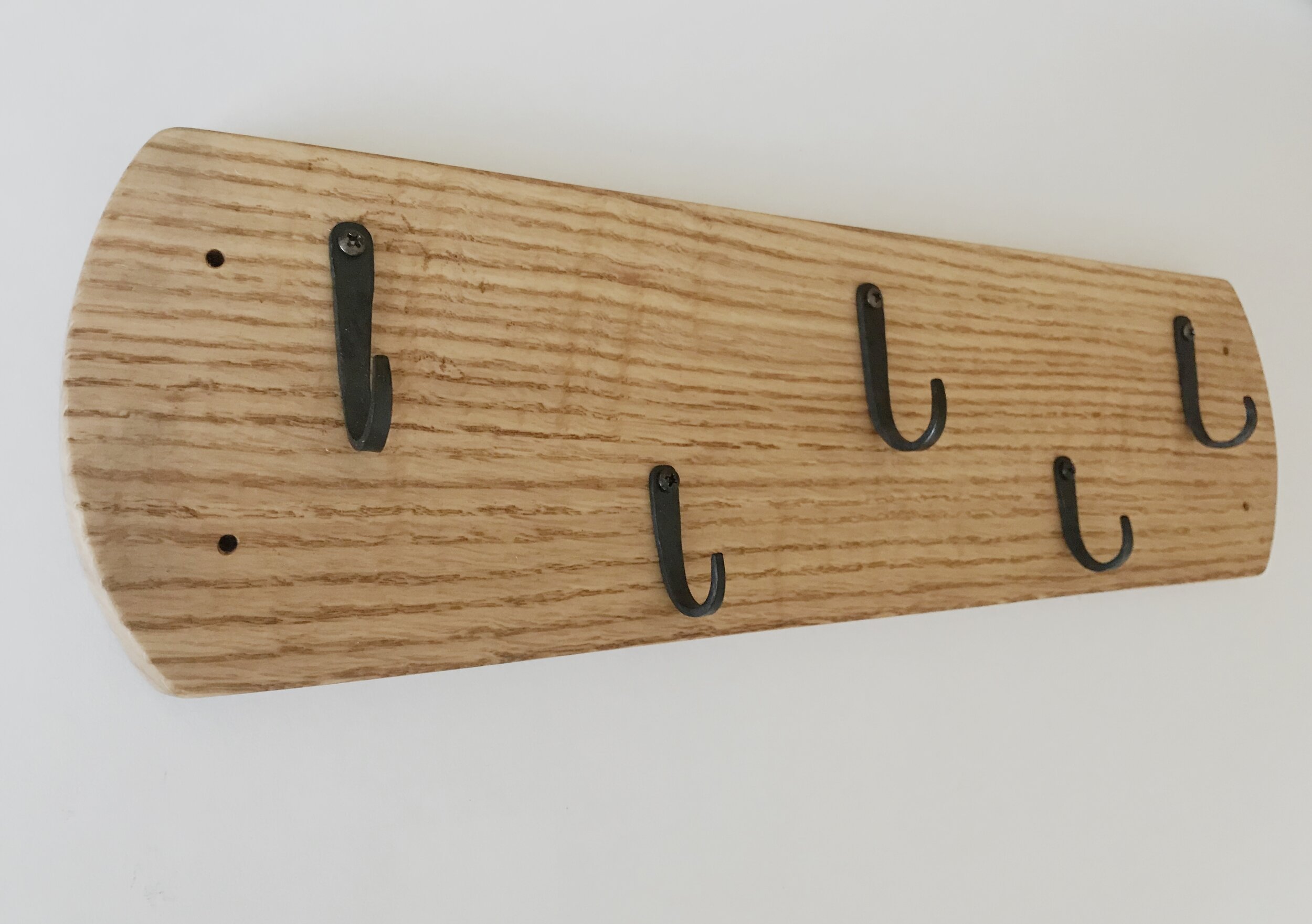 Hand forged hook rack. Was used for leashes.