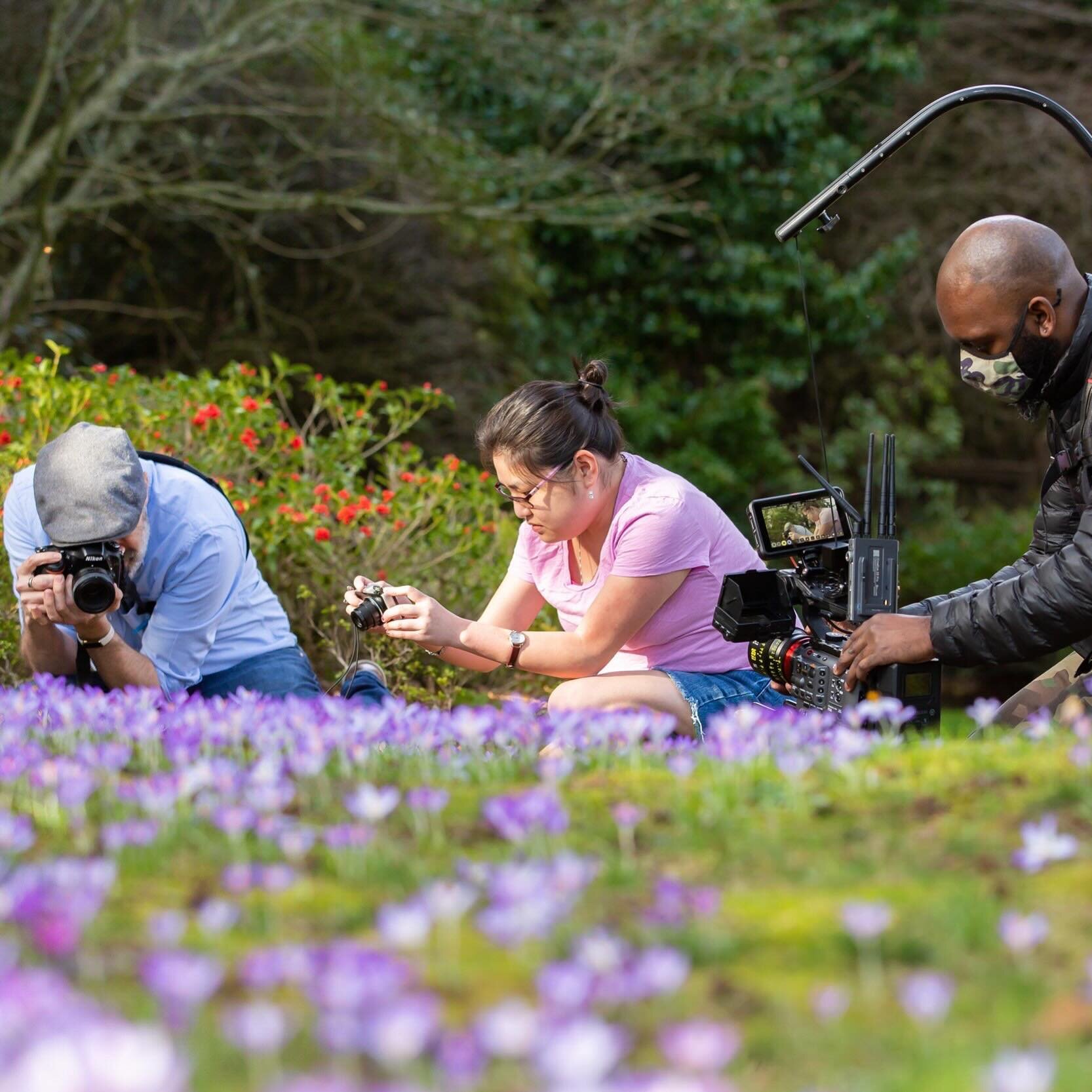 Picture this: a photography student eagerly learning the art of capturing beauty from her teacher amidst a garden of vibrant flowers. Meanwhile, we are there, filming the magic as it unfolds.

In this moment, it&rsquo;s not just about reading the sto