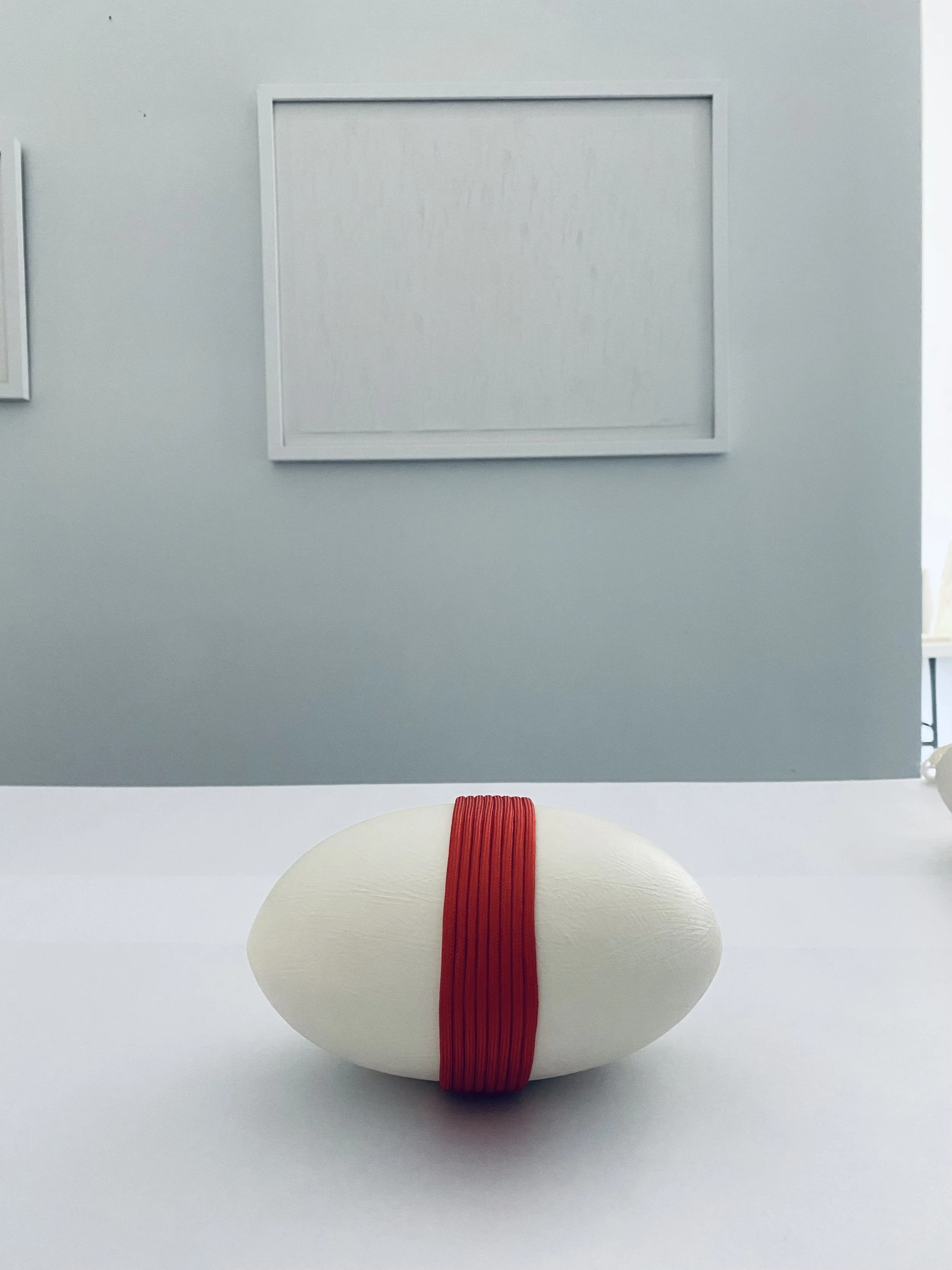 Origin, 4" x 9" x 5", stoneware, paint and rope, completed at Two Coats Residency, Long Island City, Queens, August 2025 / sold