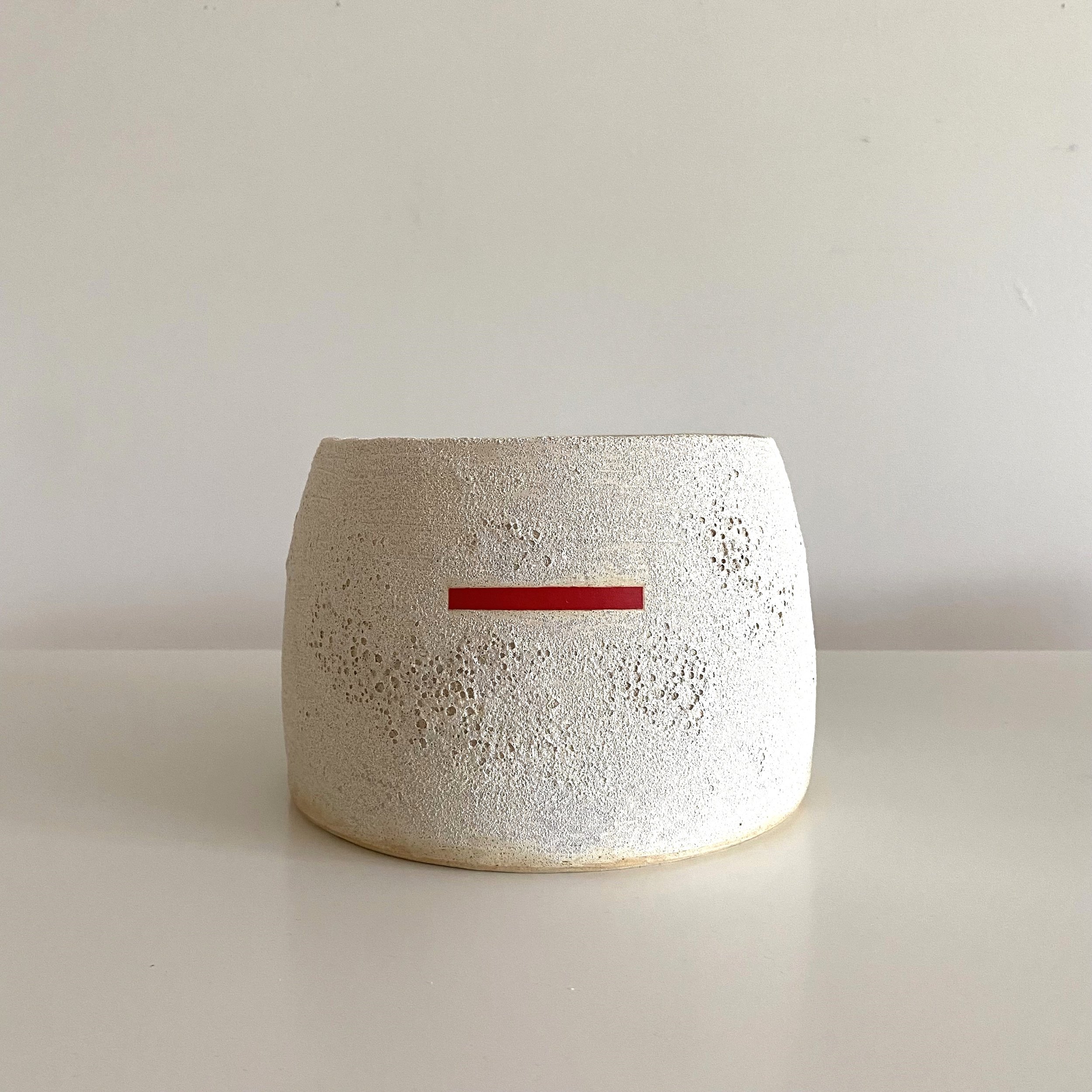 Round Tapered Vessel with Red, 4 1/2"h x 6 3/4"w x 6 3/4"d, stoneware with glaze and underglaze, 2024 / Available through Vessels + Sticks