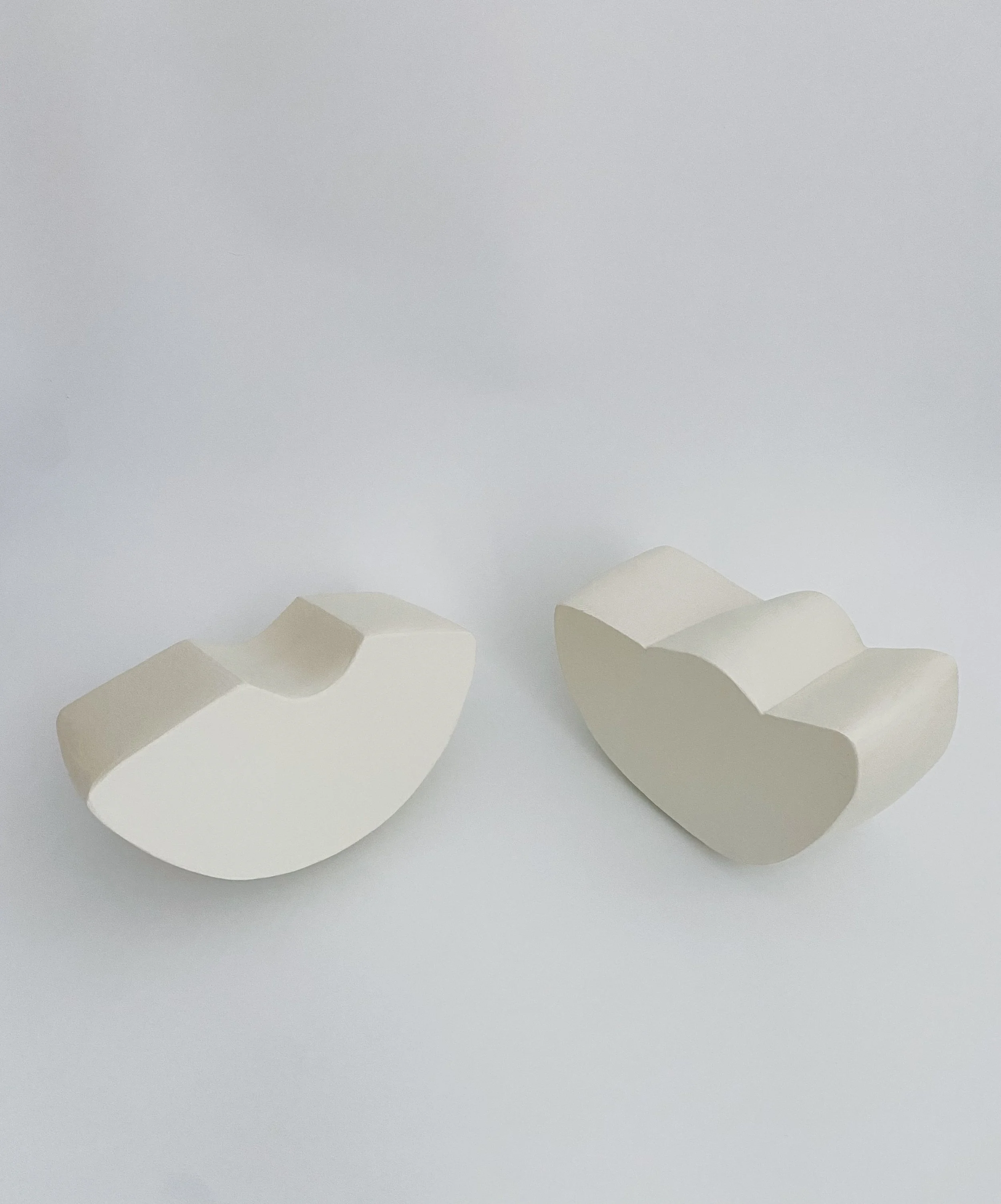 Companion, 6" x 5" x 9" and 6" x 4" x 8", stoneware, paint and wax, 2025. Exhibited at BARNSTORM 2 during Upstate Art Weekend at the Catskills Barn, Delhi, NY, in July 2025.
