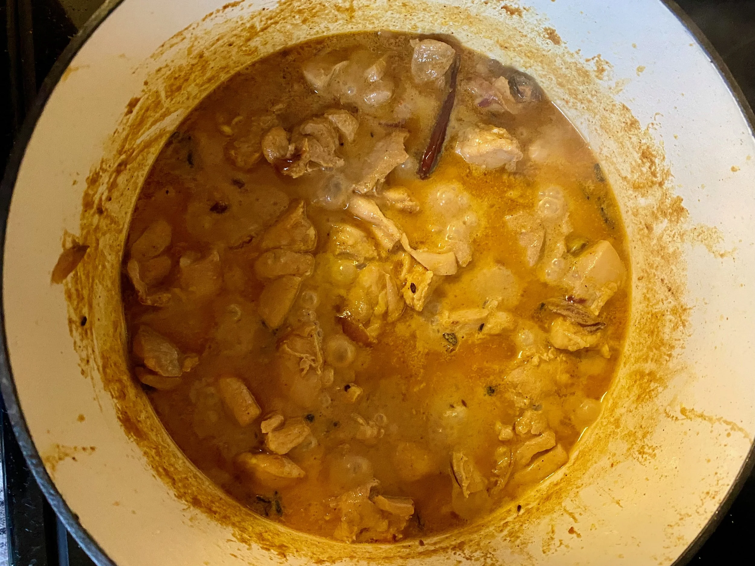 Cook chicken into the masala