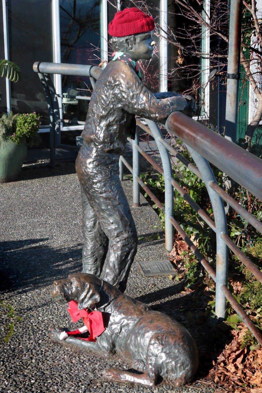 Boy and his dog, bronze by Georgia Gerber. 1st Street