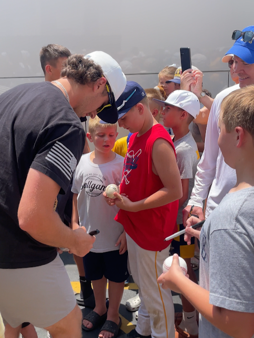 Murray State Baseball Player signs a Racer fan's baseball
