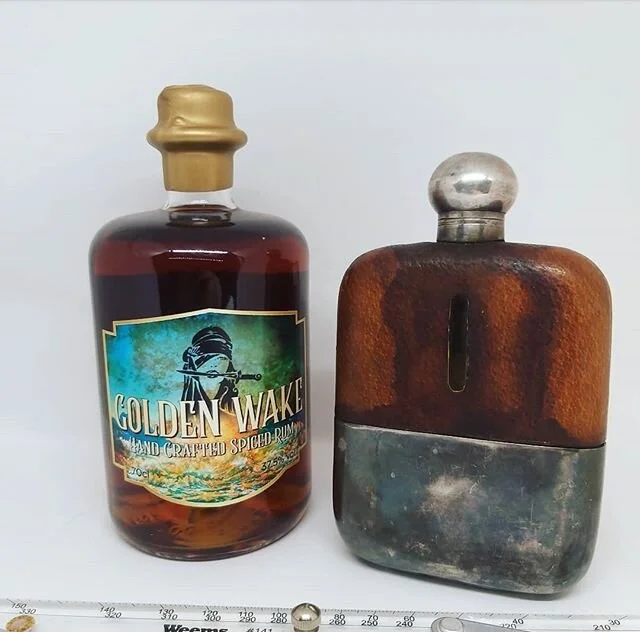 Keep warm on a cold rainy day with a hip flask of Golden Wake Spiced Rum
OFFERING FREE DELIVERY TO HR POSTCODES THIS WEEKEND..
The perfect gift for fathers day! 
Check out our website at www.goldenwake.co.uk

Dont forget to like the page to keep up t