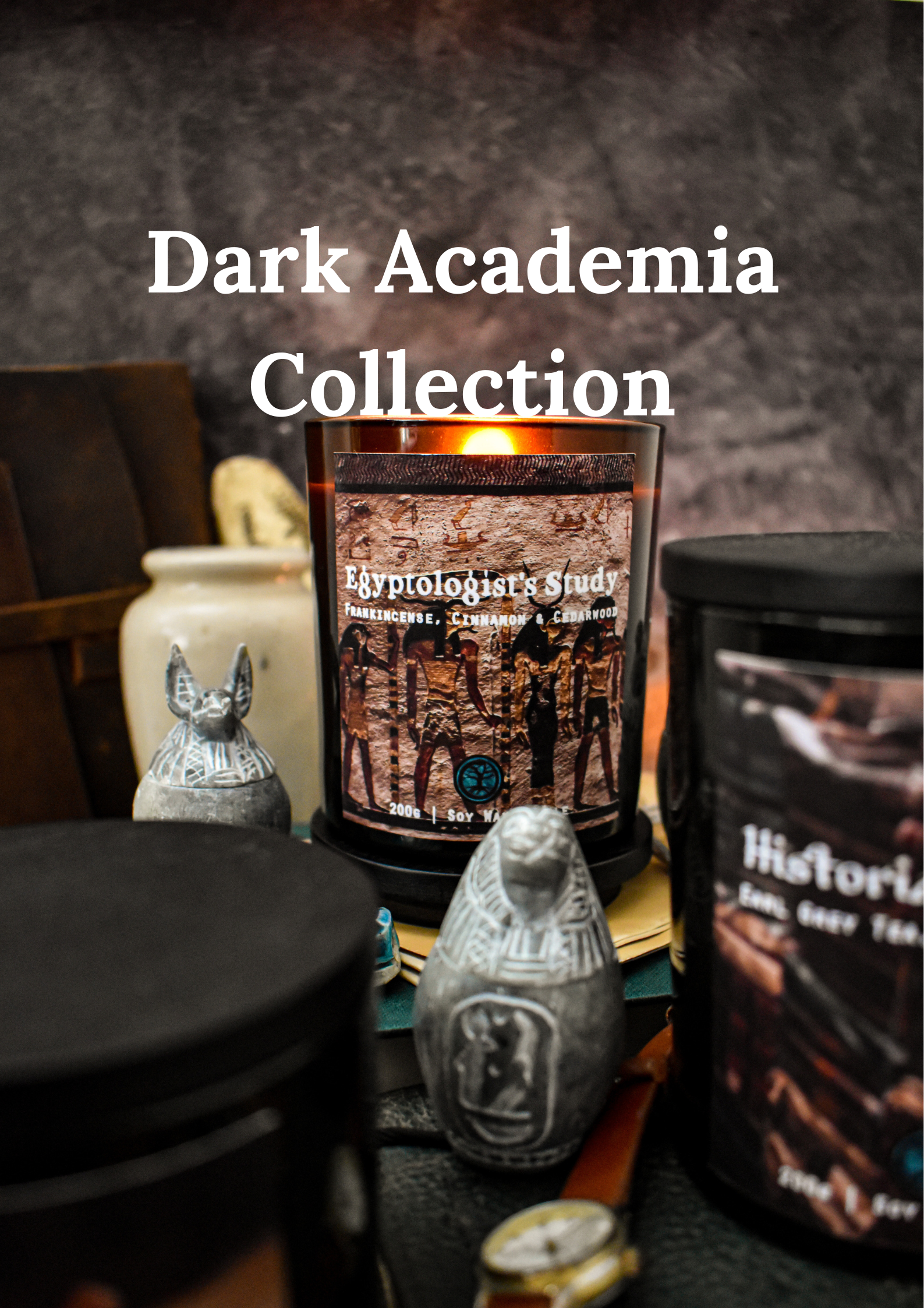 Dark Academia theme candle collection featuring an "Egyptologist’s Study" candle labeled with frankincense, cinnamon, and cedarwood, surrounded by ancient-style figurines and rustic decor.