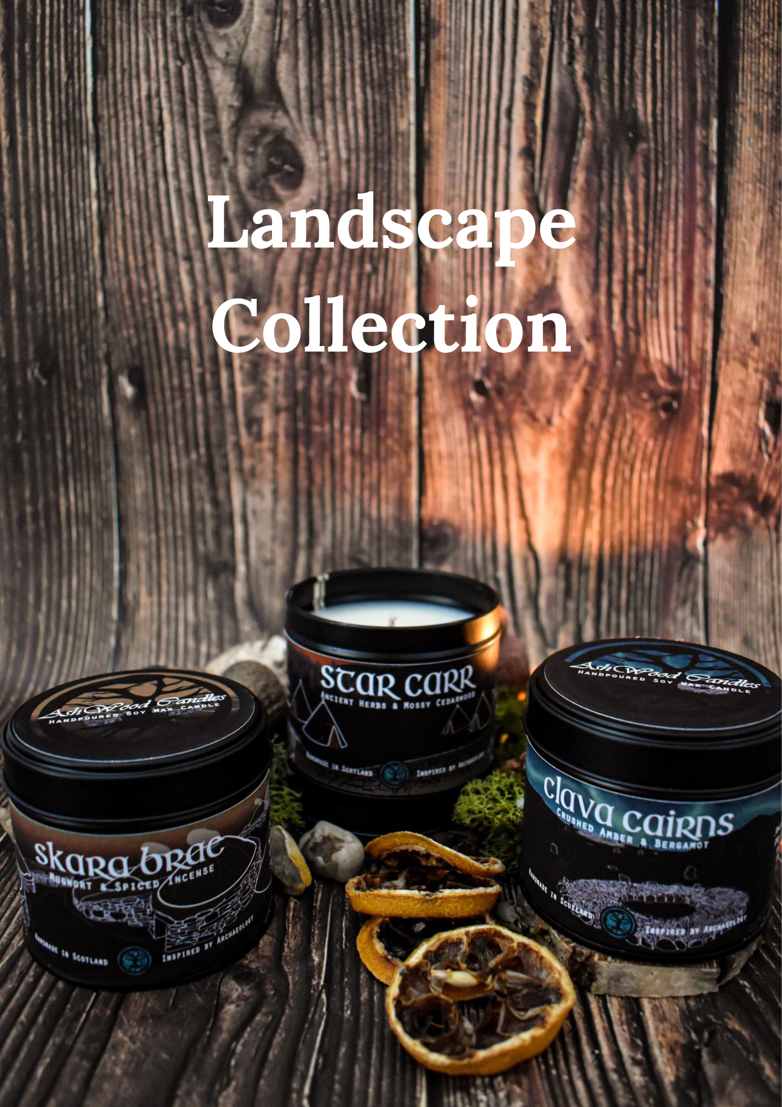 Candles from Landscape Collection on wooden surface, labeled Skara Brae, Star Carr, Clava Cairns, with dried slices and moss around them.