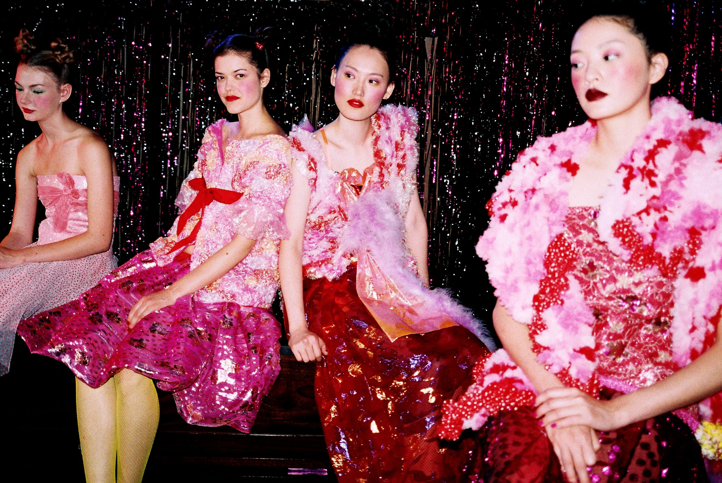 Models photographed backstage at Ryan Lo