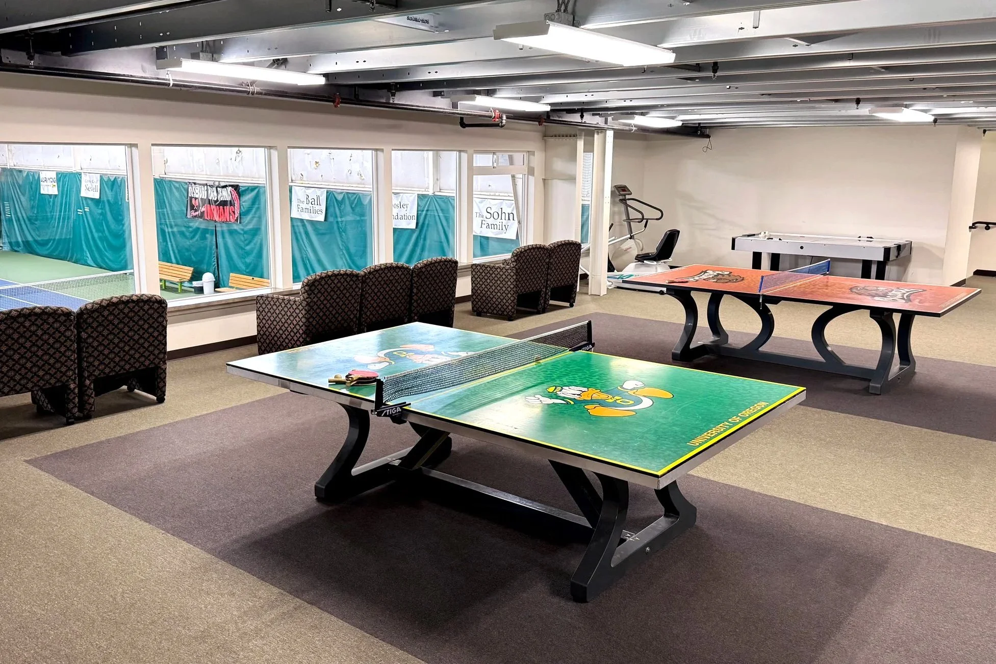 Recreation and viewing lounge overlooking the indoor courts