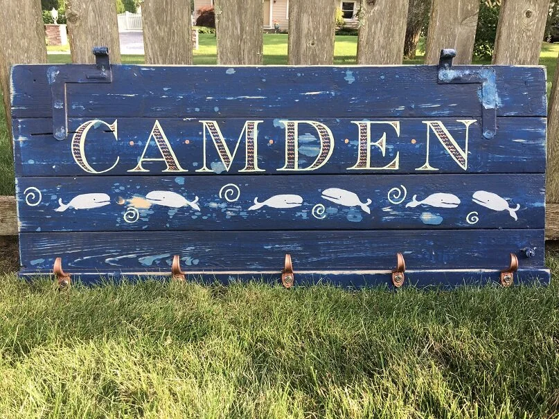 Lettering on reclaimed wood