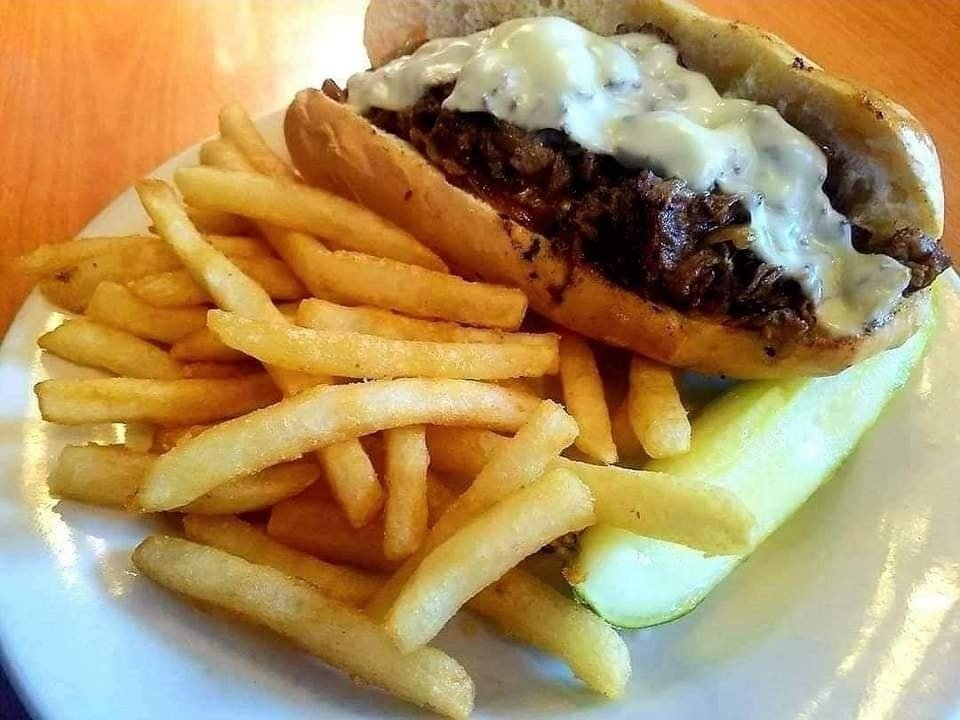 Join us for lunch this afternoon and enjoy our Philly cheese steak. Piled high with shaved ribeye, onions and mozzarella cheese... it's what a cheese steak is supposed to taste like! #beaufortsc #eatlocal