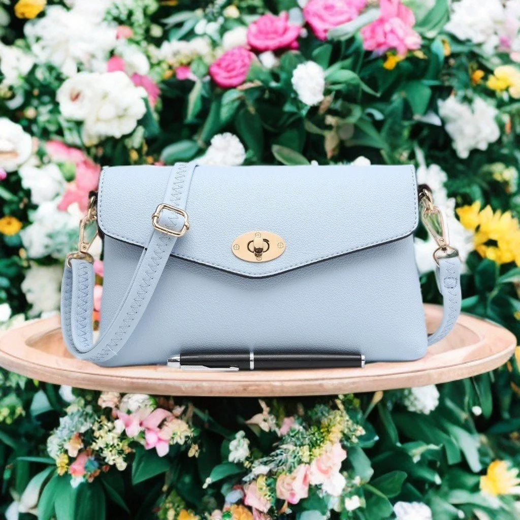 Pretty pale blue handbag - very versatile, can be used as a clutch, shoulder bag or worn across the body - the perfect accessory for summer weddings and special events - &pound;18 😍