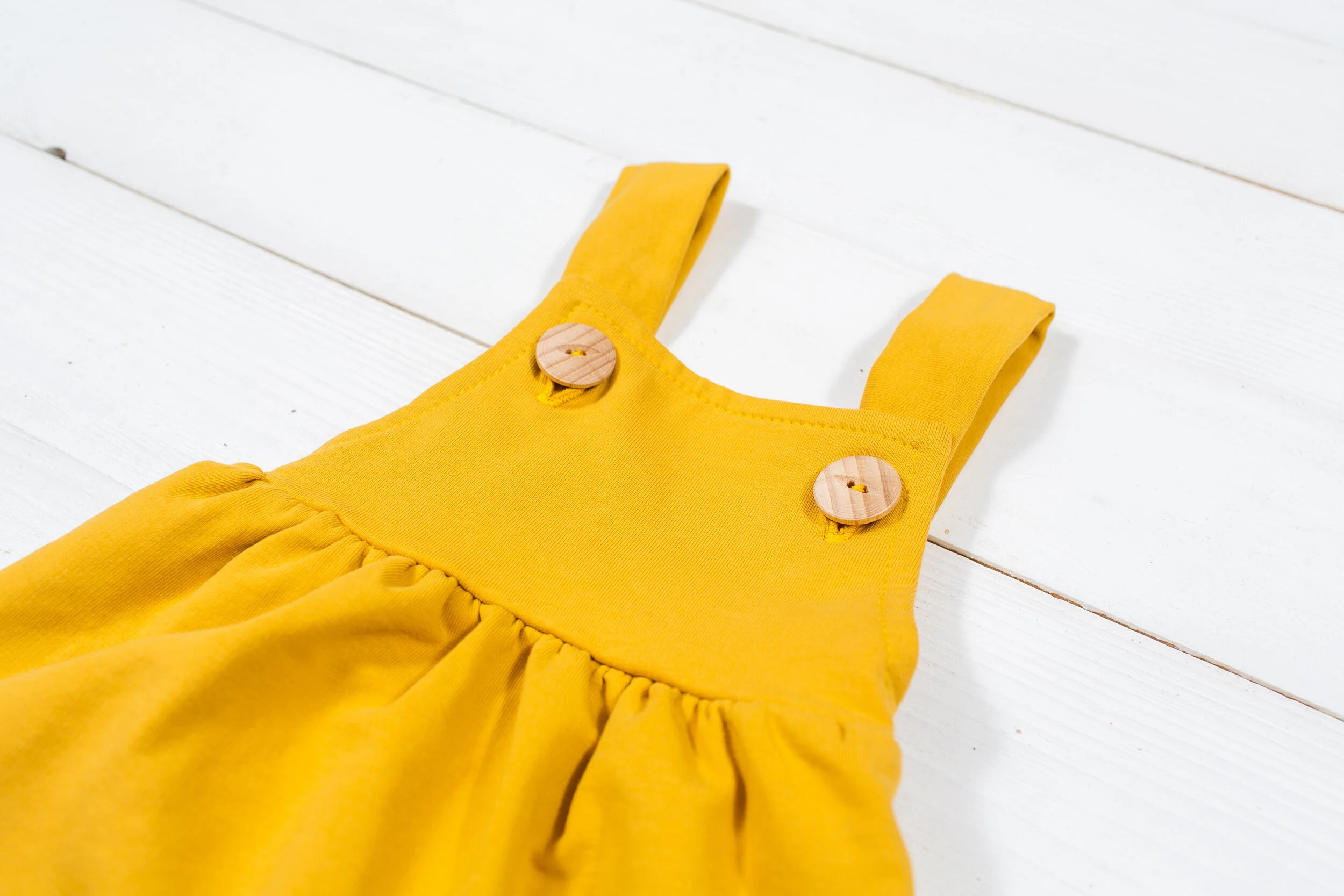 mustard dungarees baby
