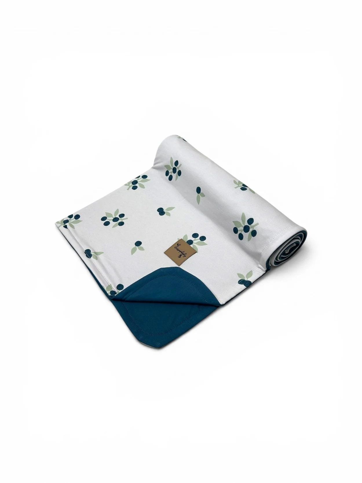 Folded reversible baby blanket with an exclusive blueberry print on white cotton fabric and a teal reverse by DressUpBaby.