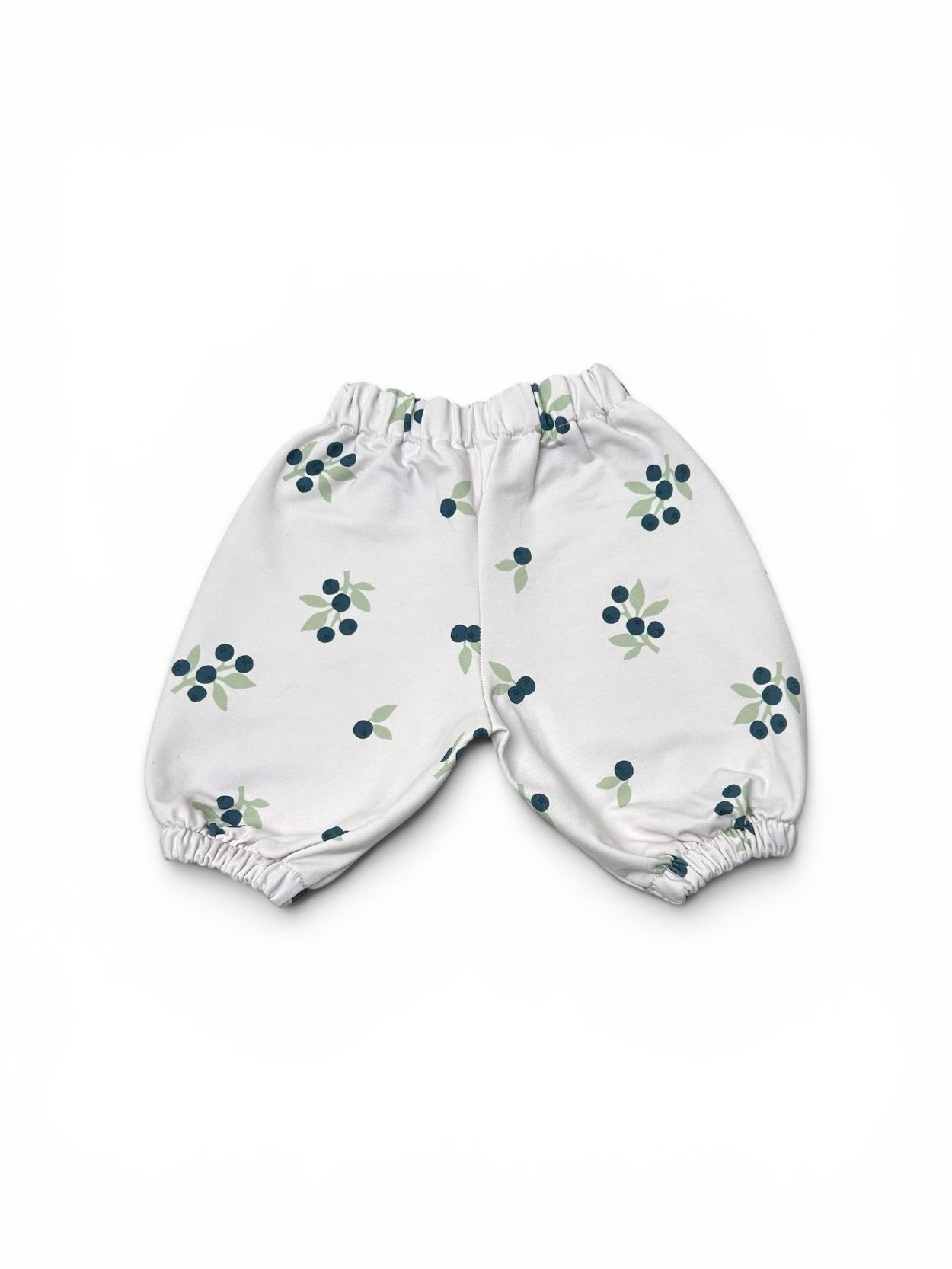 Back view of blueberry baggy baby trousers with elasticated waistband and exclusive DressUpBaby blueberry print.