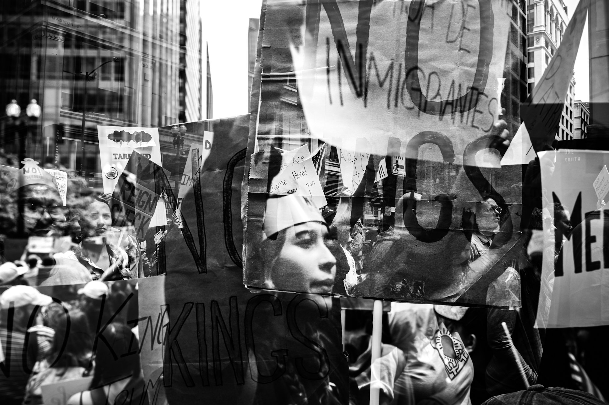 Layered multi exposure image of protestors and signs at the No Kings rally in Chicago
