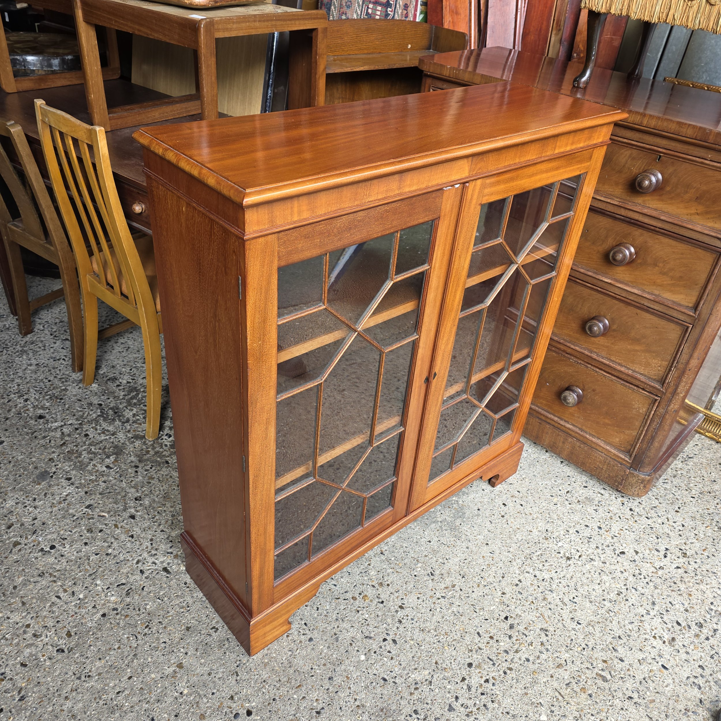 £125 - glazed bookcase - 100cm wide 32cm deep 109 cm high