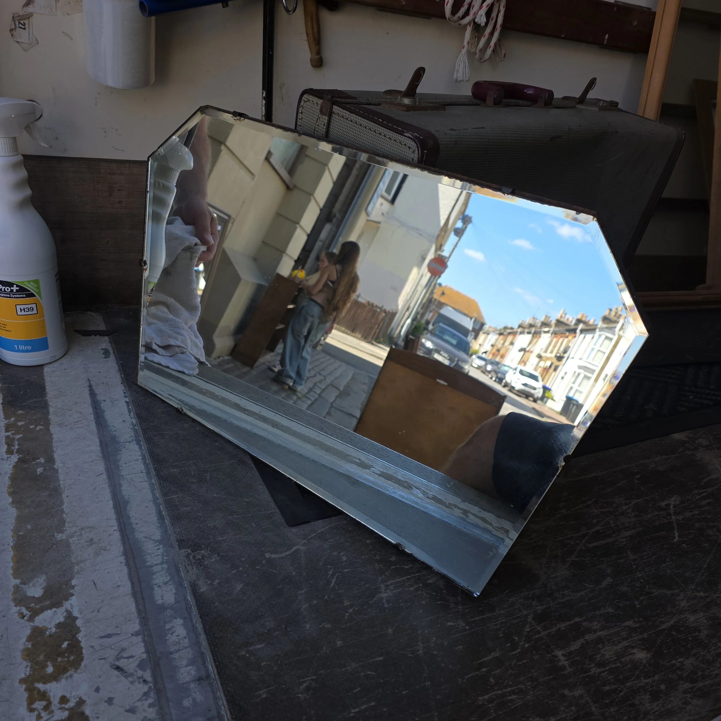 £30 - frameless mirror 61cm by 36cm