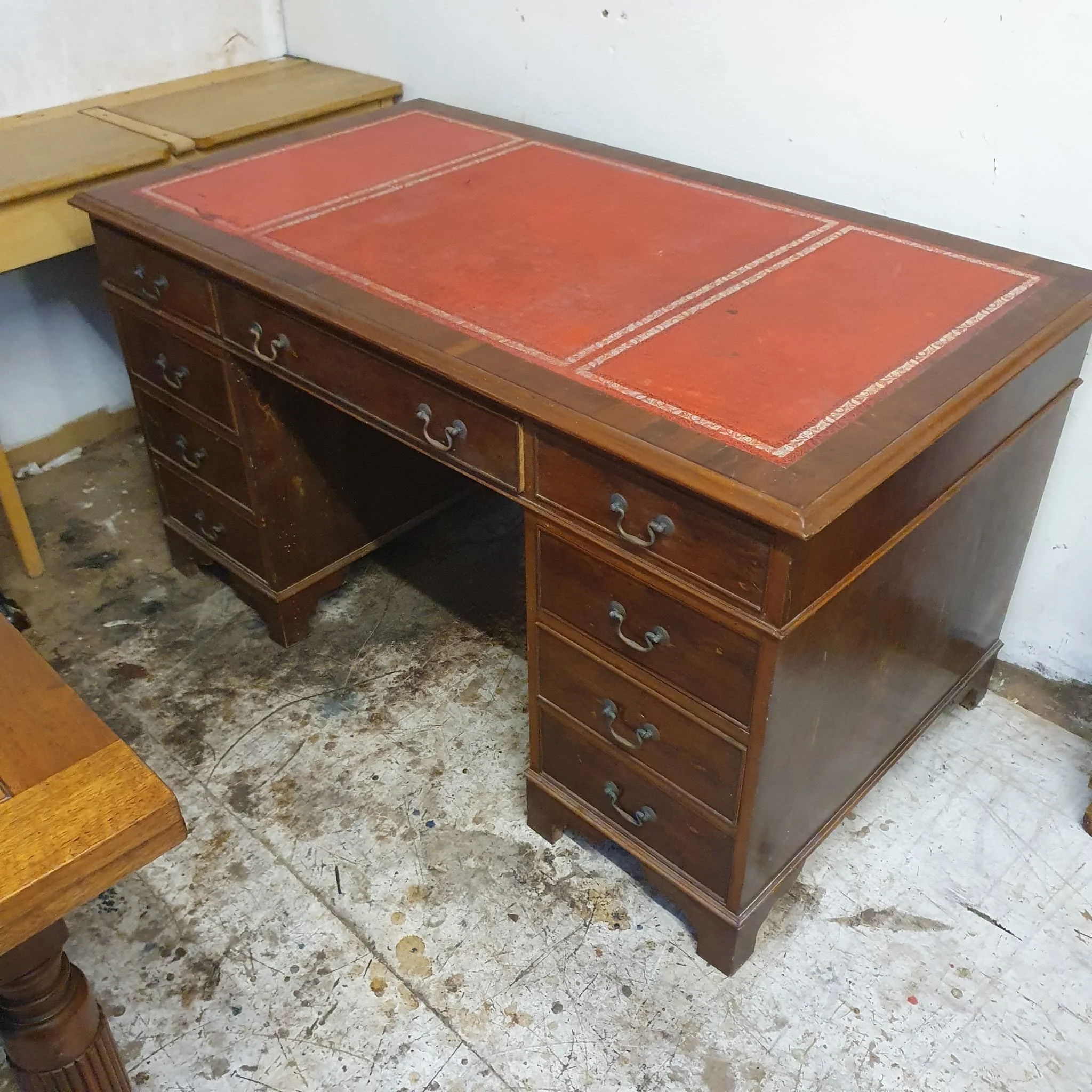 £145 - 9 drawer leather top deck - 141cm wide 79cm deep  77cm high  - needs a little loving