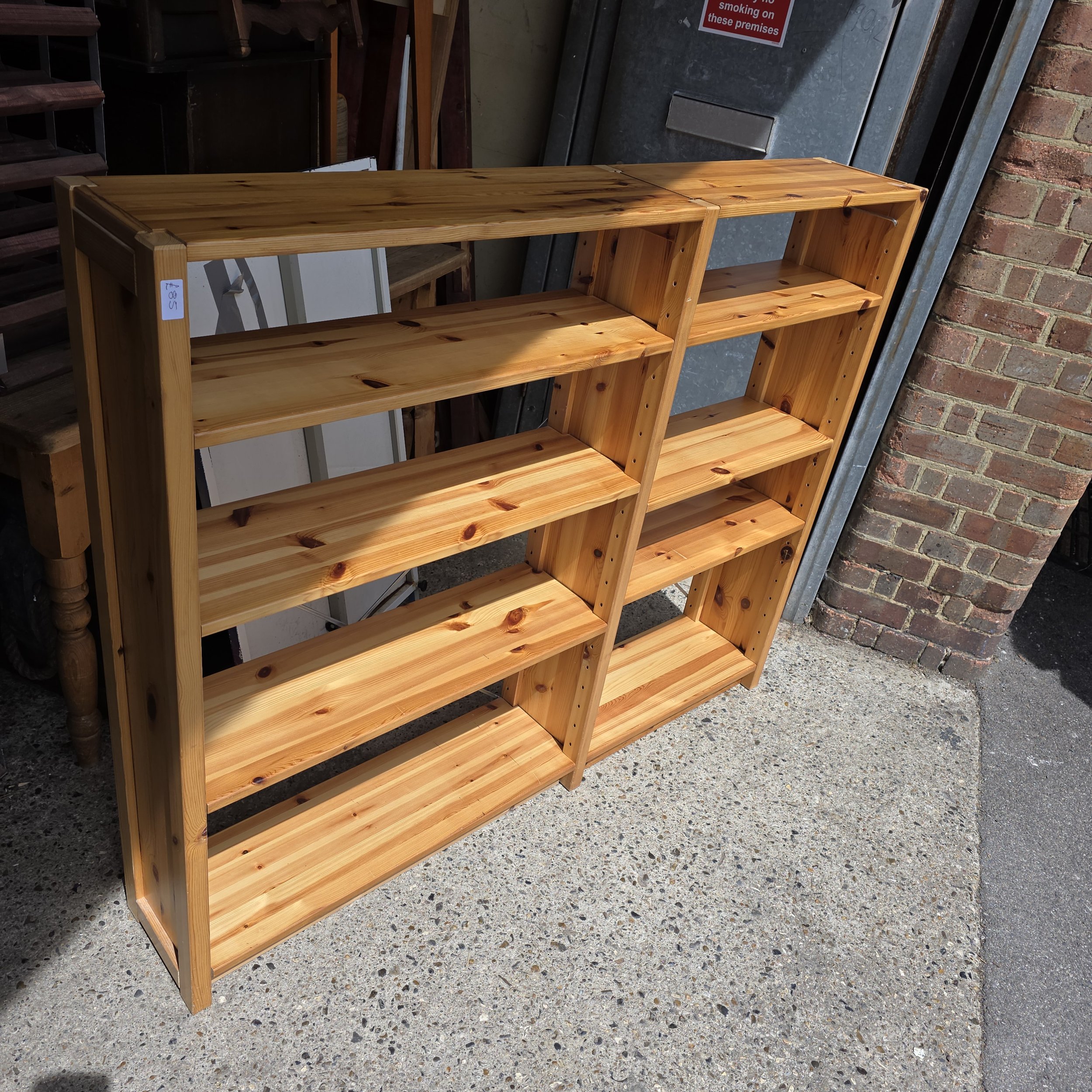 £85 - pine book shelving 143cm wide 25cm deep 119cm high