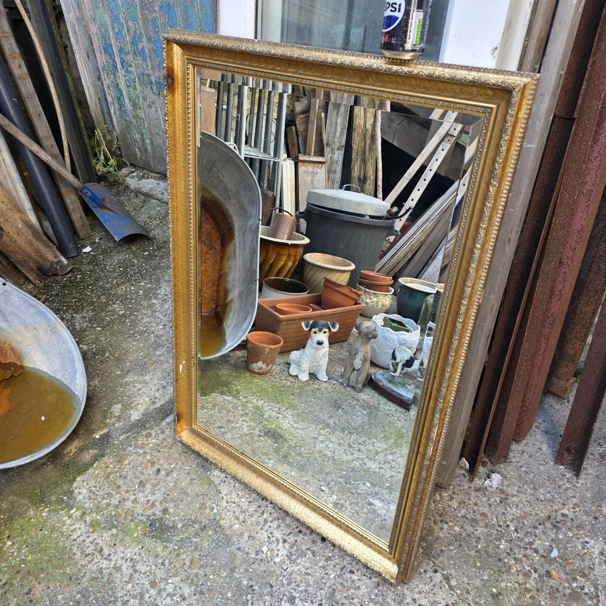 £40  - gilt mirror  - 72cm by 102 cm -  small fault