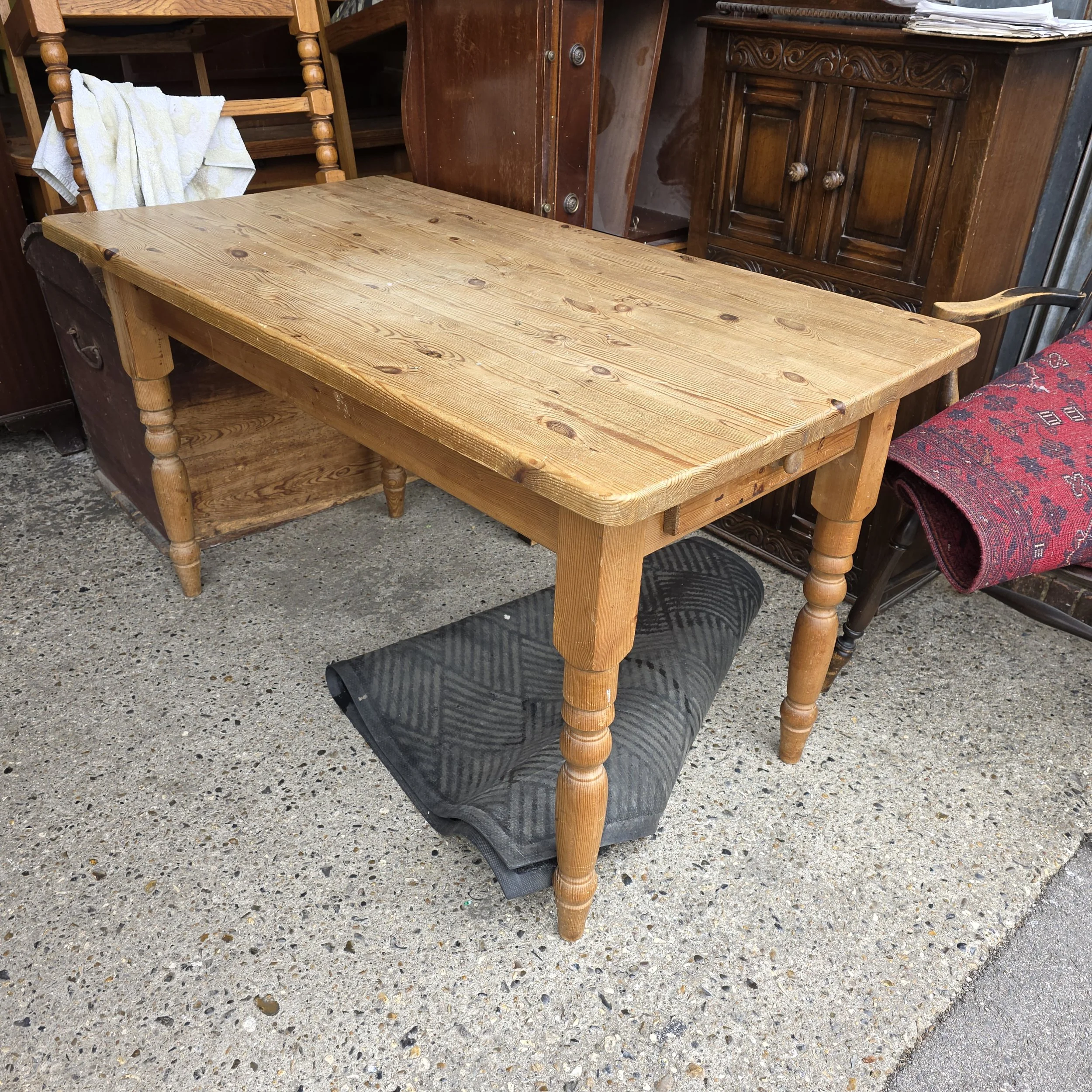 £75 - pine kitchen table with draw at both ends - 137cm by 73cm   77cm high