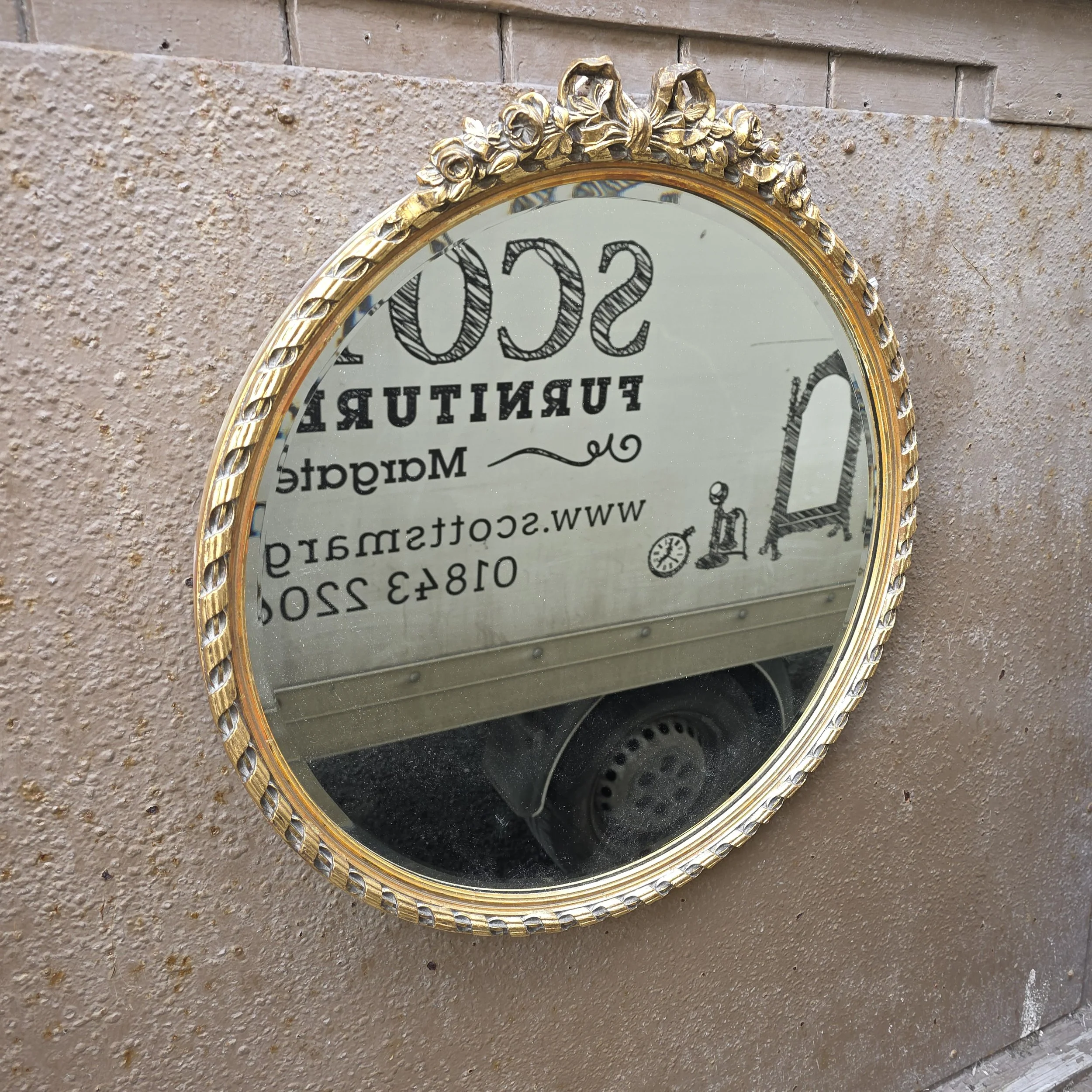 £75 -  round gold mirror 55cm by 58cm