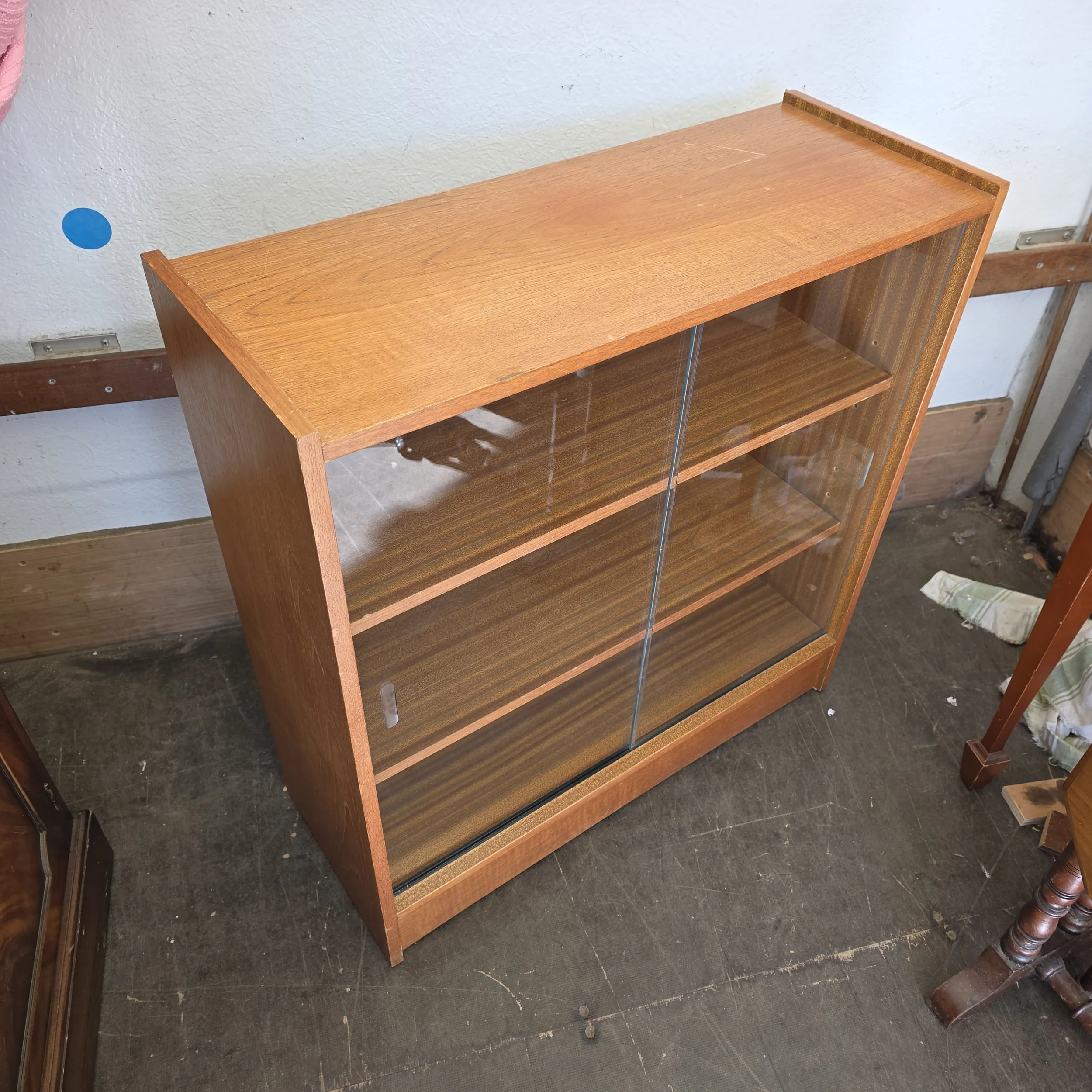 £80 - sliding door bookcase  - 75cm wide 30cm deep 80cm high