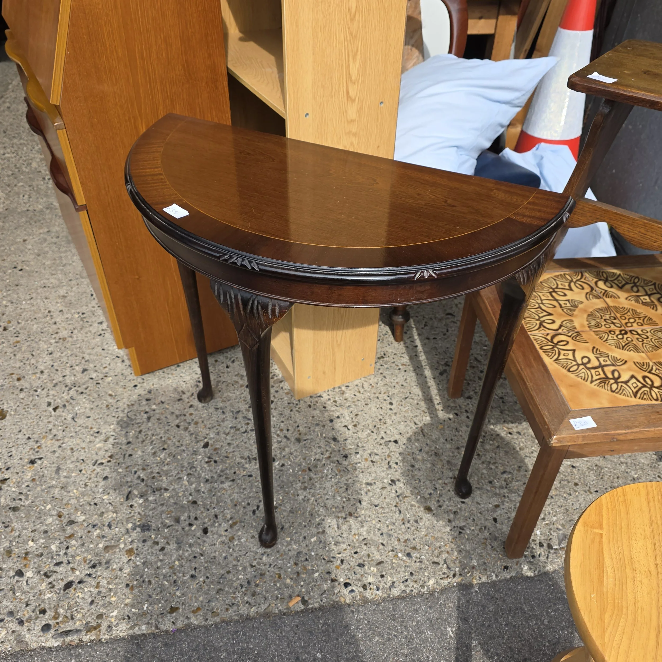£35 - half round table -  78cm wide 38cm deep 72cm high
