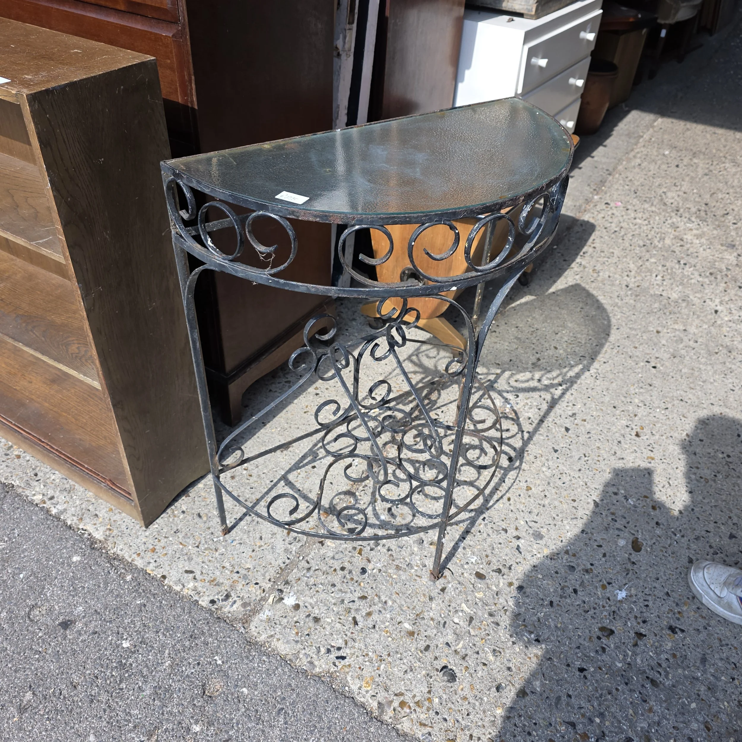 £25 - half round metal table - 65cm wide 32cm deep 82cm high