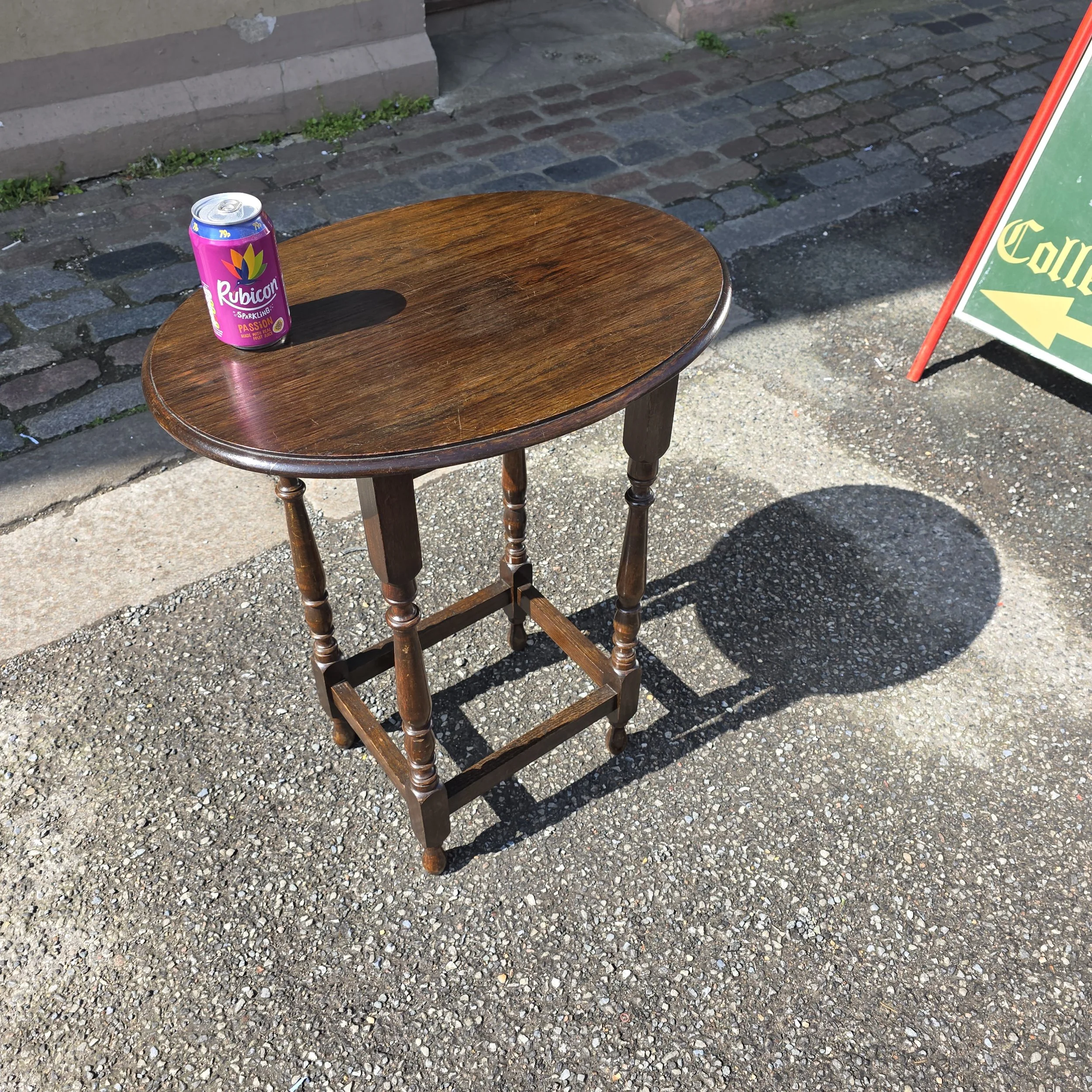 £55 - oval oak occasional table - 58cm wide 42cm deep 72cm high