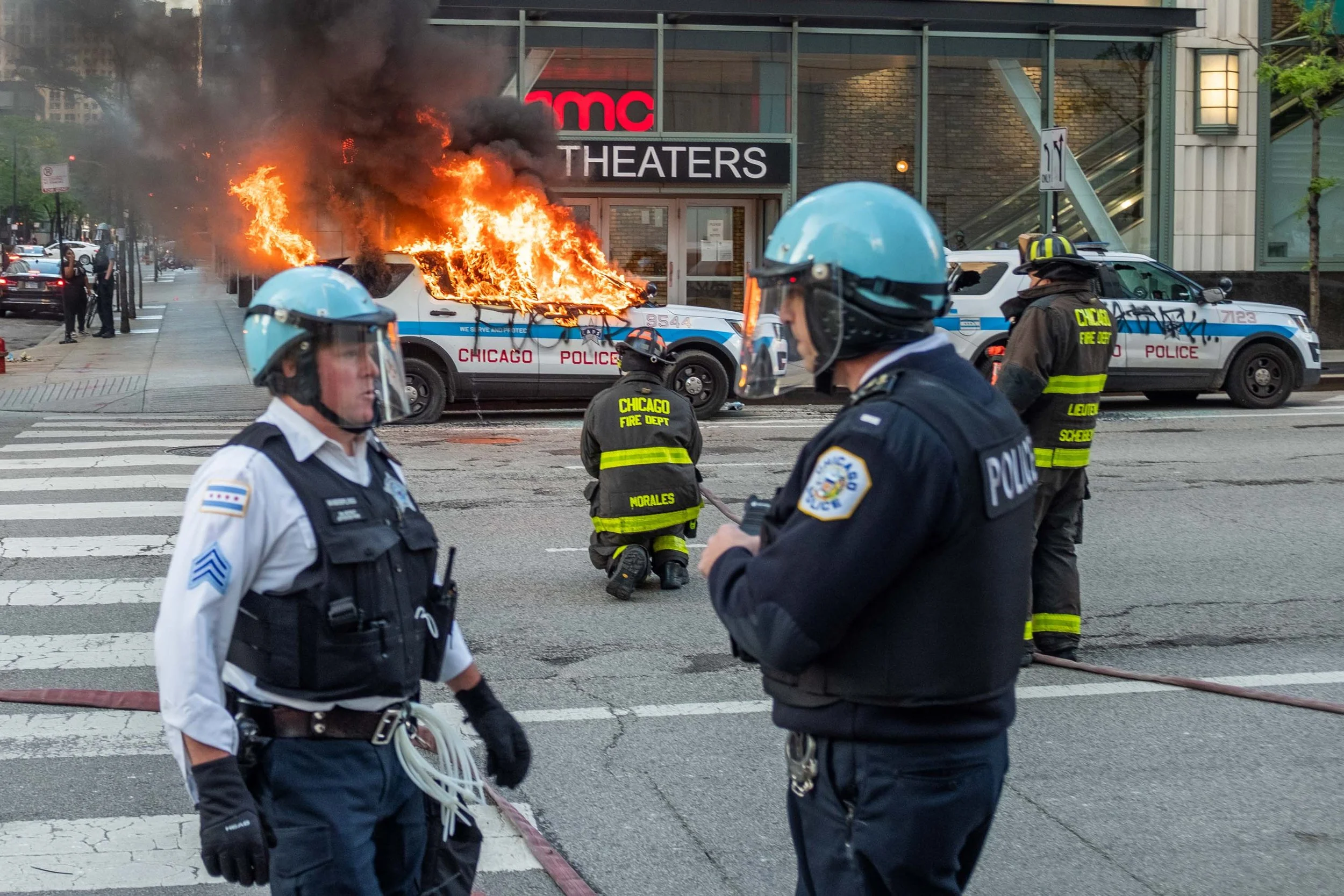 I saw a guy with a joker face calmly watching a police car burn. Days later thanks again to Twitter, I found out that the joker face had lit up the cop car, and was calmly watching it burn when I passed by. He had a neck tattoo and his joker face was
