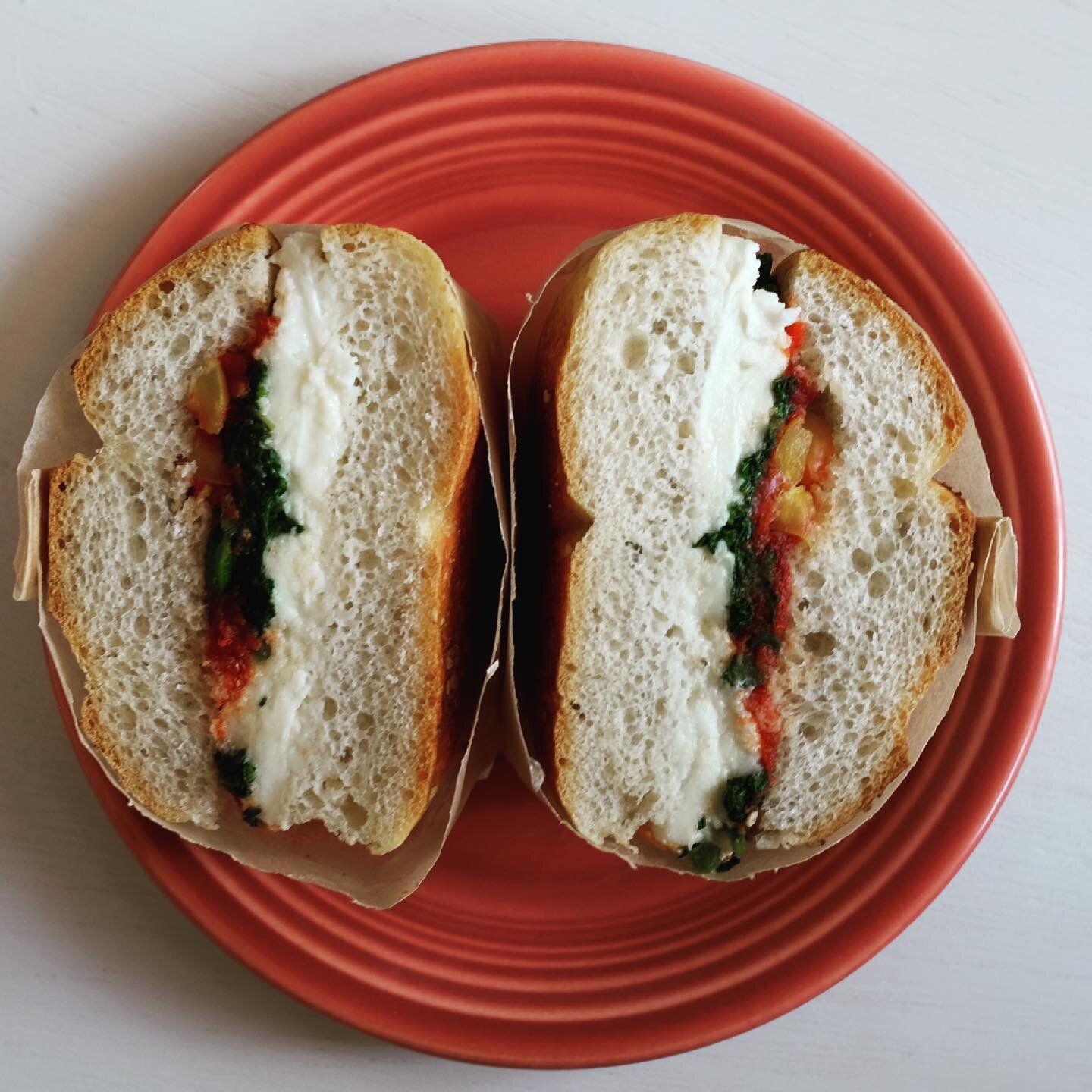 Lunch is served.  Broccoli rabe and mozzarella sandwich with tomato jam and pickled peppers.  Corporate catering is full steam ahead - hit us up for your next photoshoot, socially distant office hang or anything else you need. 👊👊