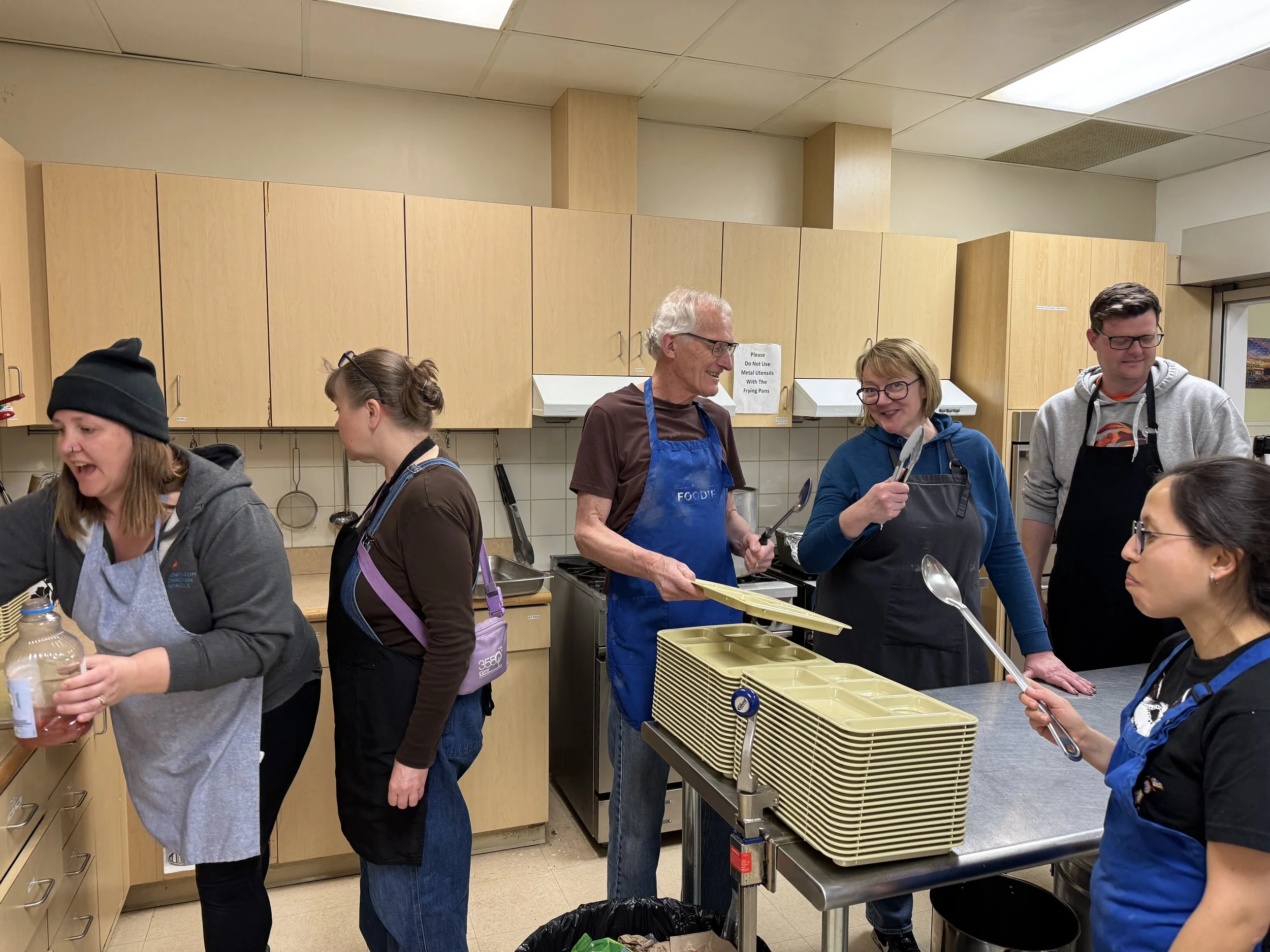 Getting ready to serve supper at PrayerWorks