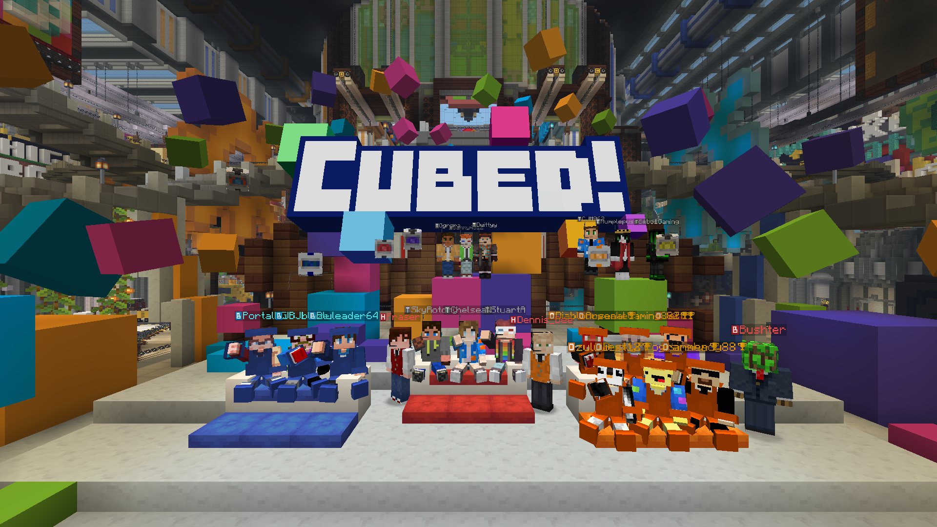 An in-game screenshot from Gameshow Showdown. Inside the factory front door, players gather in front of a sign reading “Cubed!”.