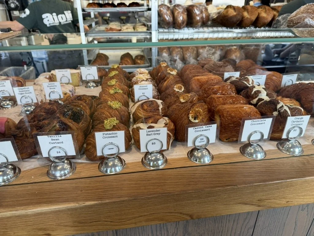 Picture of the display case showing the pastries that are served at Aioli.