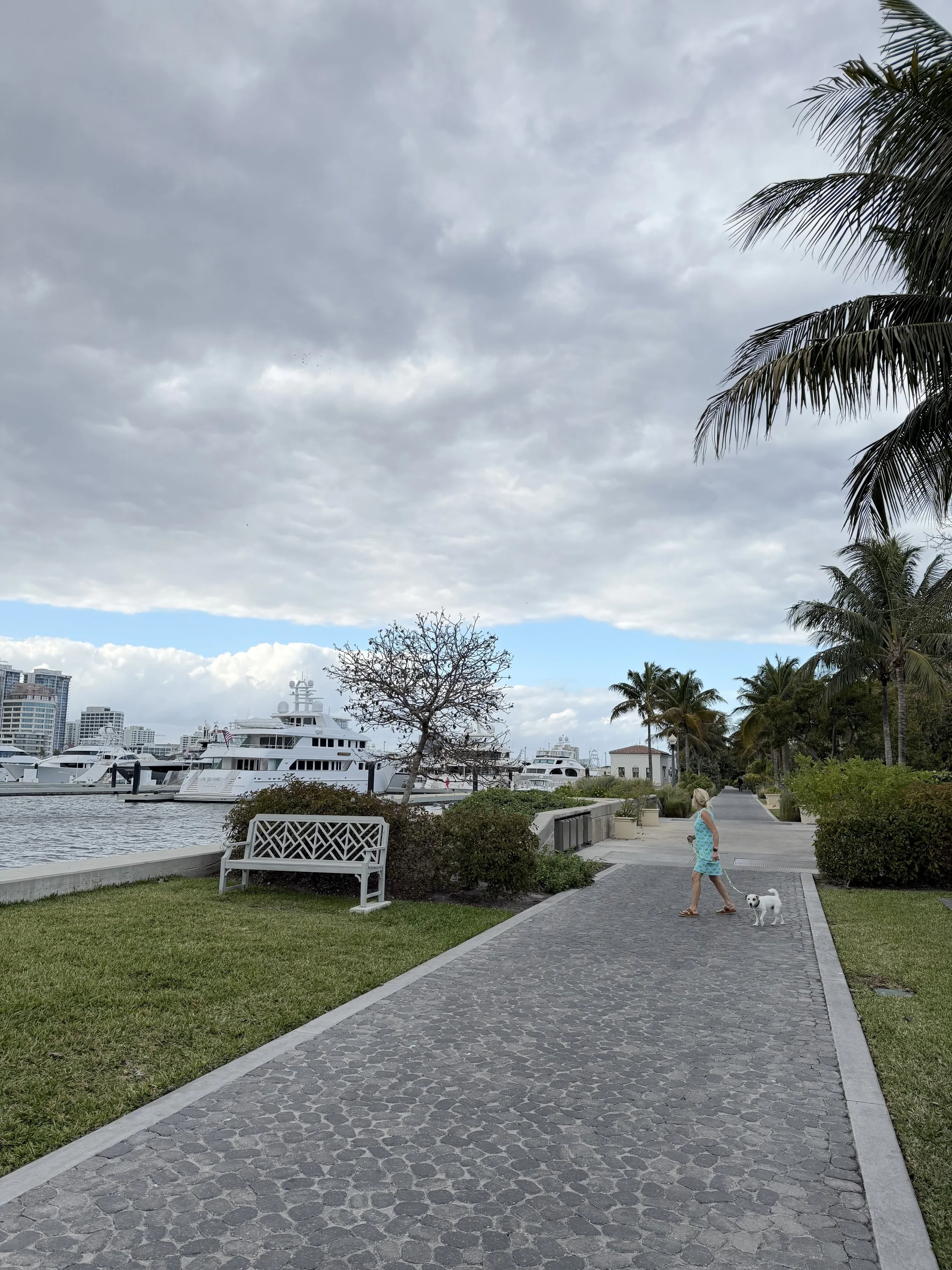 Yachts visible from the walking path along the Intracoastal at Worth Avenue