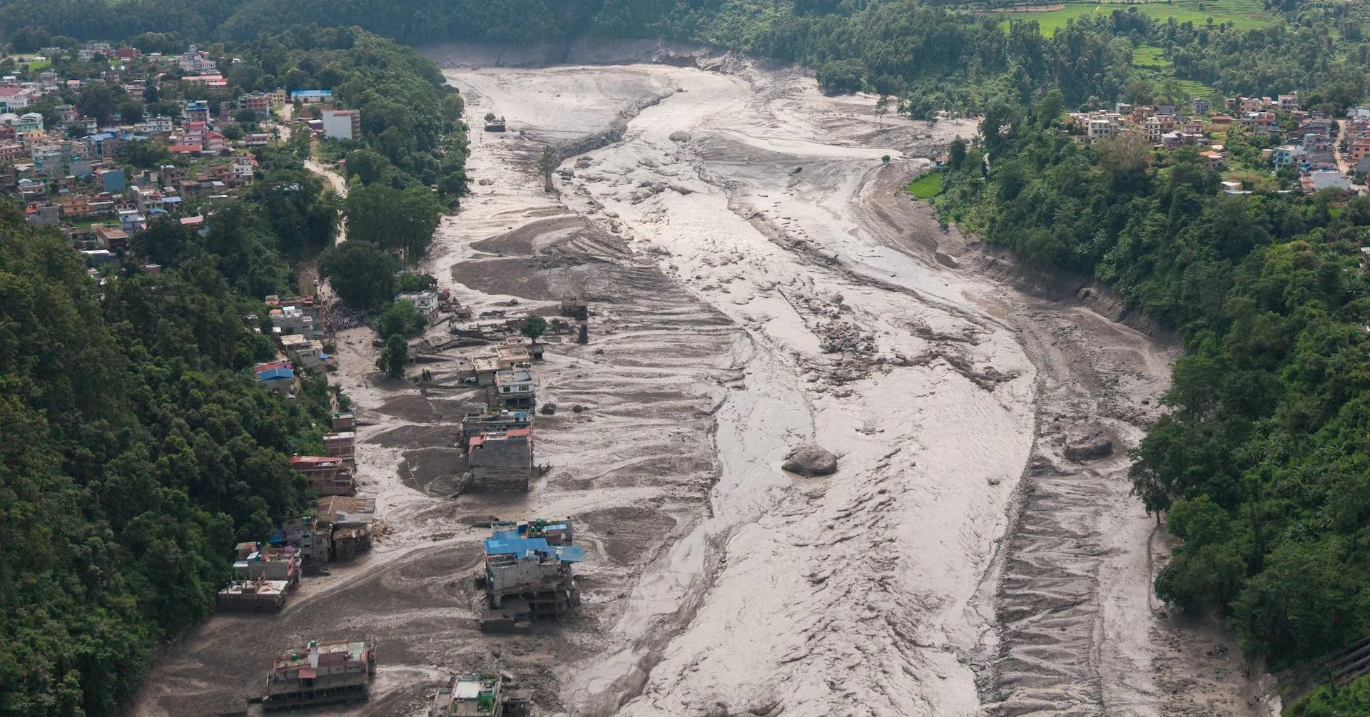 A drone view shows mud covering properties at Trishuli in Nuwakot district, Nepal, August 26, 2026. REUTERS/Stringer