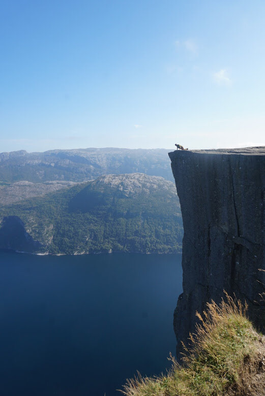 His and her Pulpit Rock photos - Andy getting as close as possible to the edge.