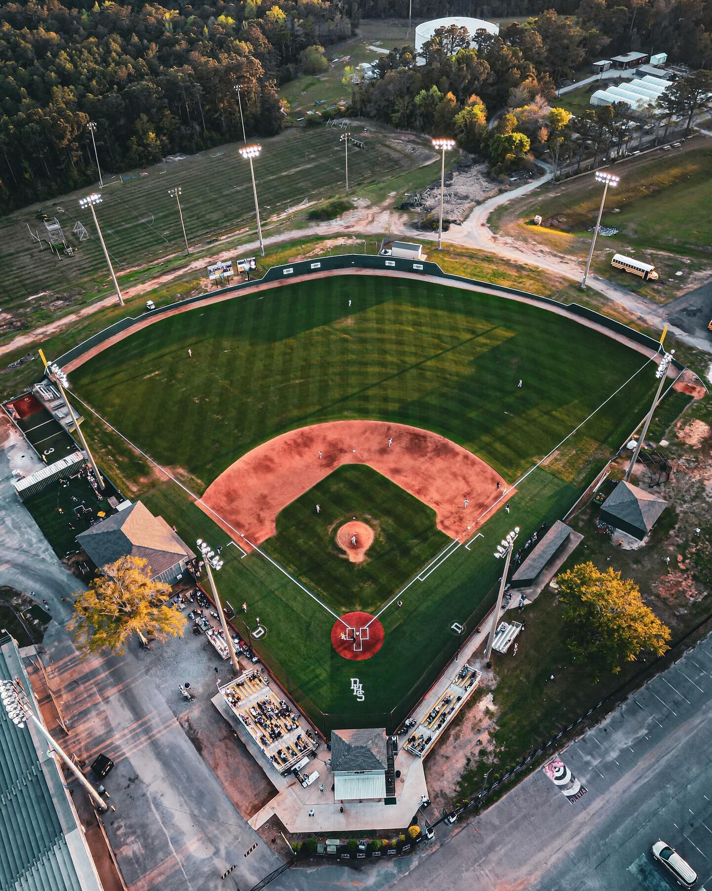 Livin the dream one shot at a time. #dronephotography #djimini3pro @daphnebaseball game. Saturday night sunsets.