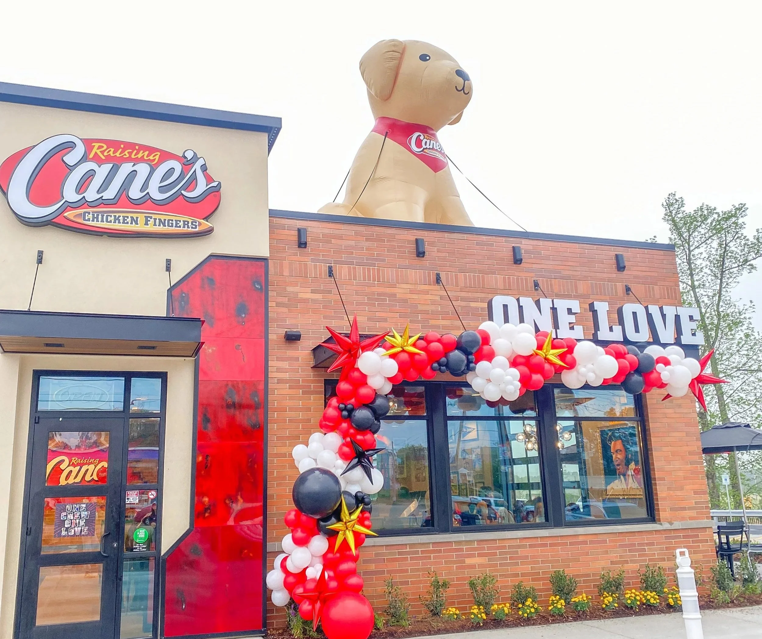 Raising Cane's balloon garland in Byram, Mississippi.