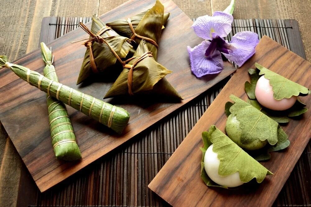 Japanese rice cake Chimaki and Kashiwa mochi with Japanese Iris.jpeg